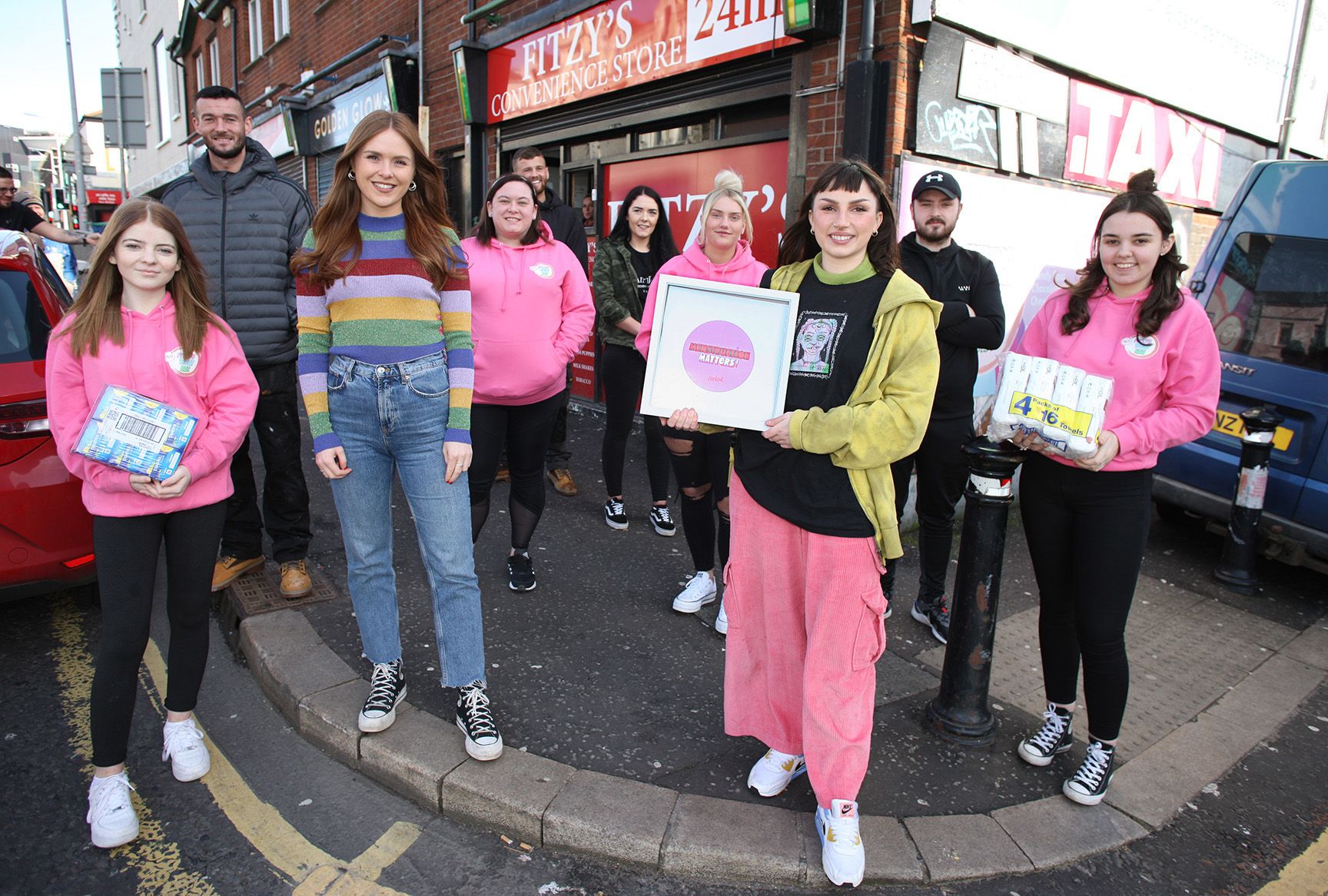 TAKING A STAND: Fitzy’s fighting period poverty with artist Nuala Convery and members from the charity Homeless Period Belfast