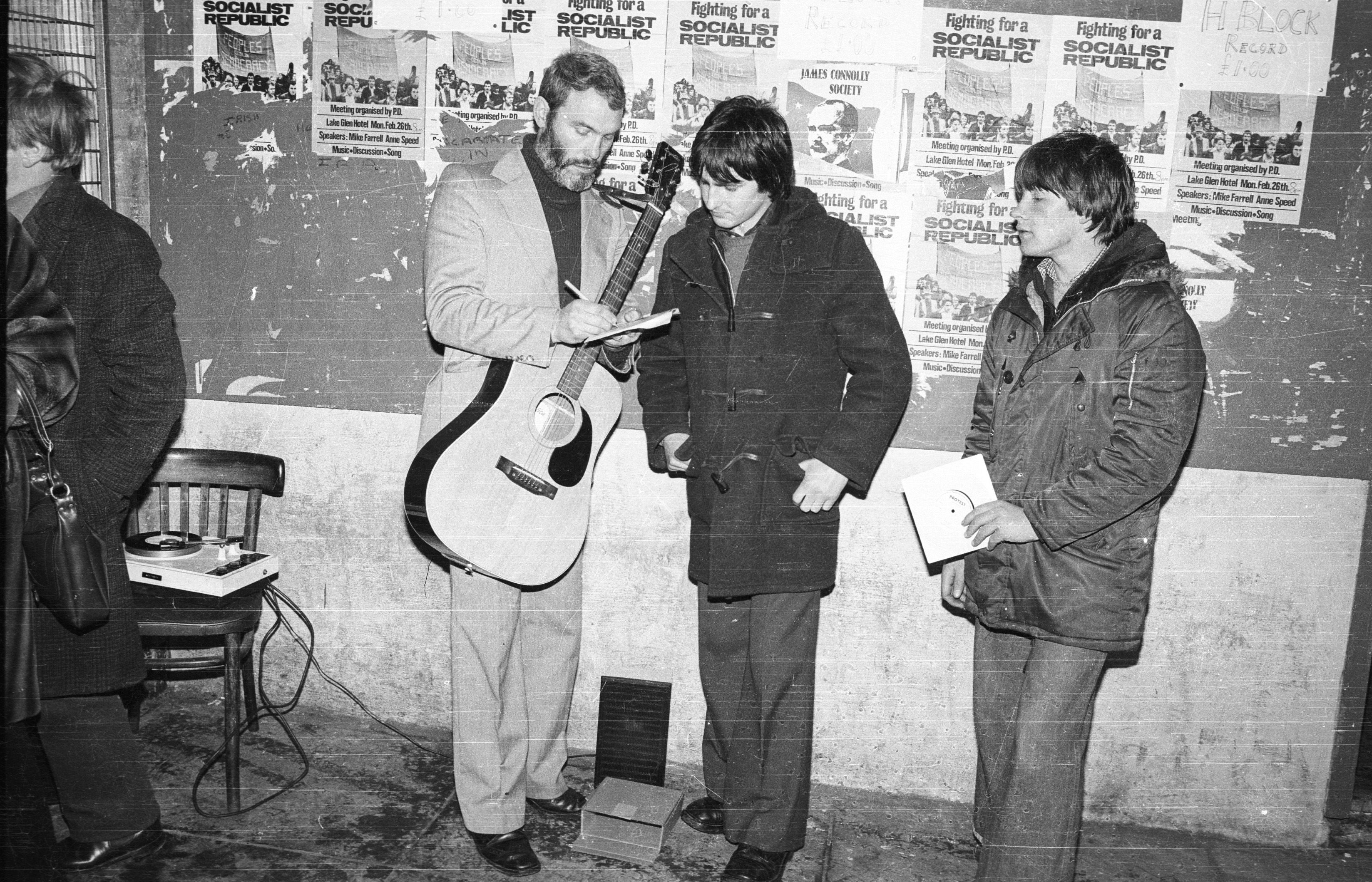 PROTEST SONGS: Francis Brolly signs copies of his H-Block record at Siopa an Phobail in Andersonstown