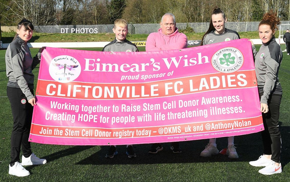 SUPPORT: Sean Smyth with players from Cliftonville Ladies football team