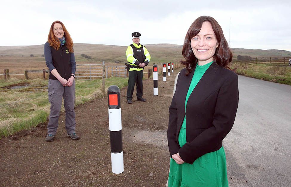 SOLUTION: Minister Nichola Mallon, the National Trust’s Director for NI, Heather McLachlan, and PSNI Superintendent Nigel Henry at the new passing places