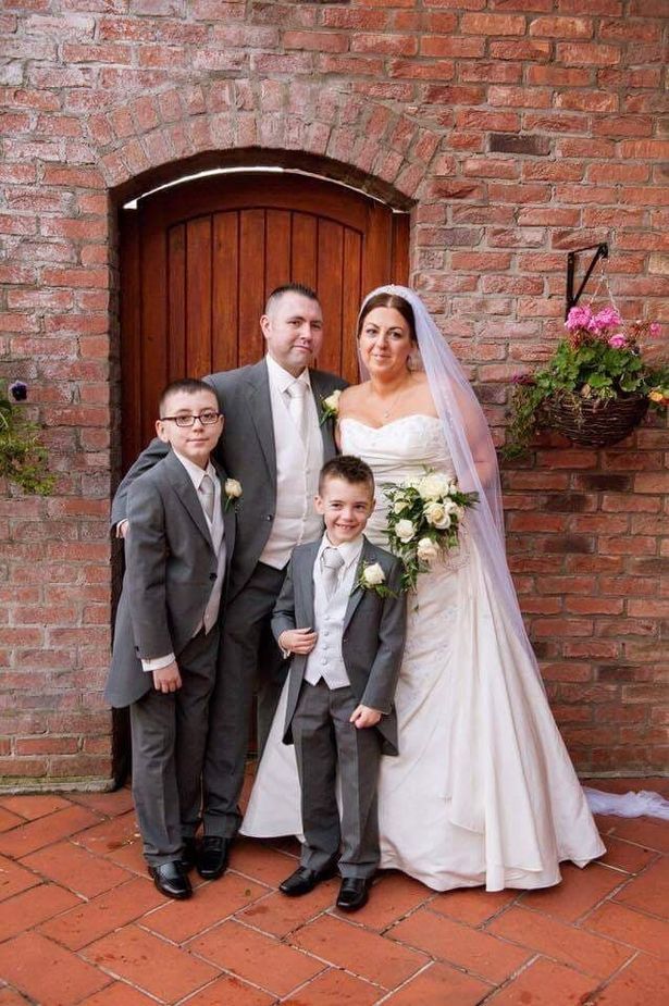 TOGETHER: Darren Smyth on his wedding day with wife Jenna and sons DJ and Alexander