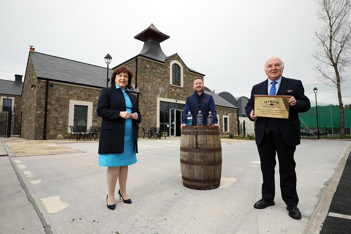 NEW VENTURE: At the official opening of Hinch Distillery are Economy Minister Diane Dodds, Head Distiller at Hinch Aaron Flaherty, and owner Dr Terry Cross