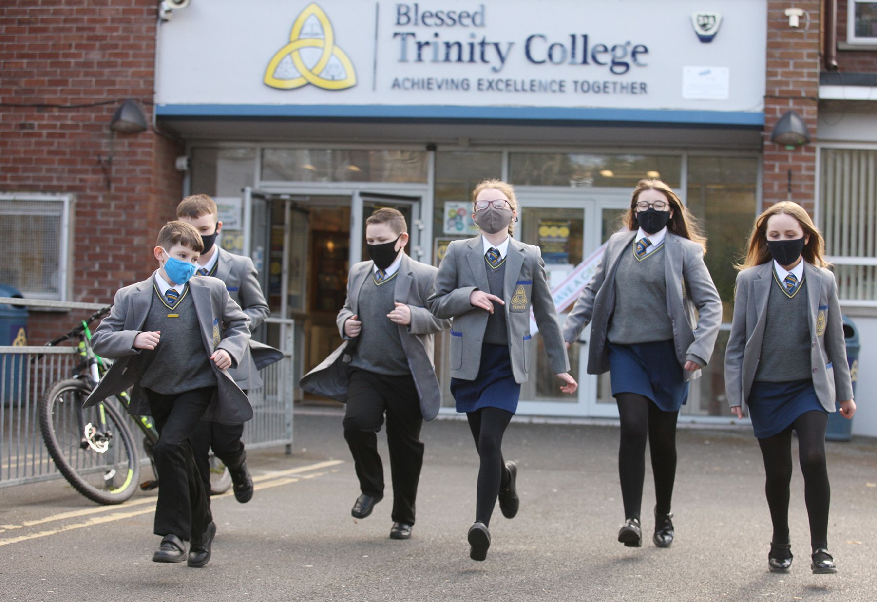 SCHOOL BUT NOT AS KNOW IT: Children at Blessed Trinity College in North Belfast return after lockdown. Now pupils and teachers will be offered regular testing. 