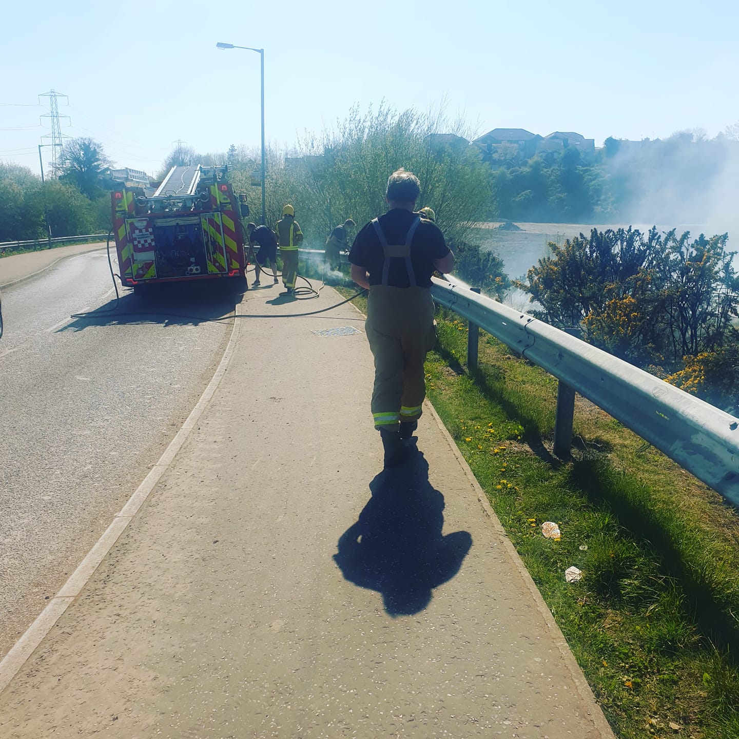 FIRE-BUGS: Fire fighters tackle the blaze at Lagmore Avenue