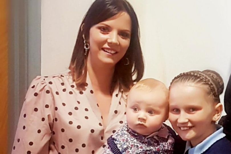 FIGHTING SPIRIT: Sharon Rooney (37) with her children, Grace (13) and Cadain (2). 