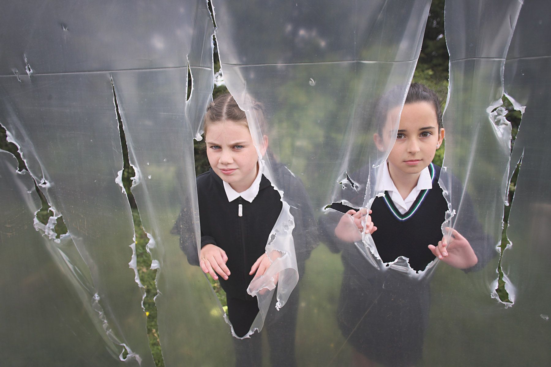 DEVASTATED: Our Lady\'s Girls PS pupils Orlagh Flood and Tara Curran at the vandalised polytunnel