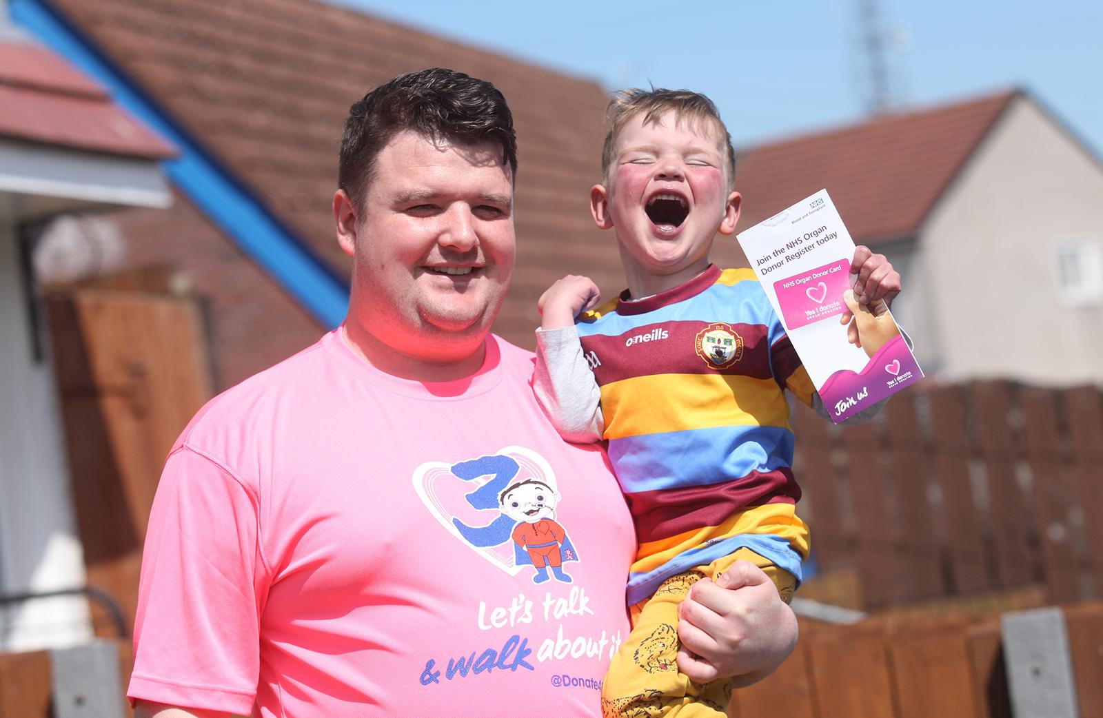 RAISING THE ROOF: Little Dáithí Mac Gabhann and dad Máirtín launch the new initiative this week. 