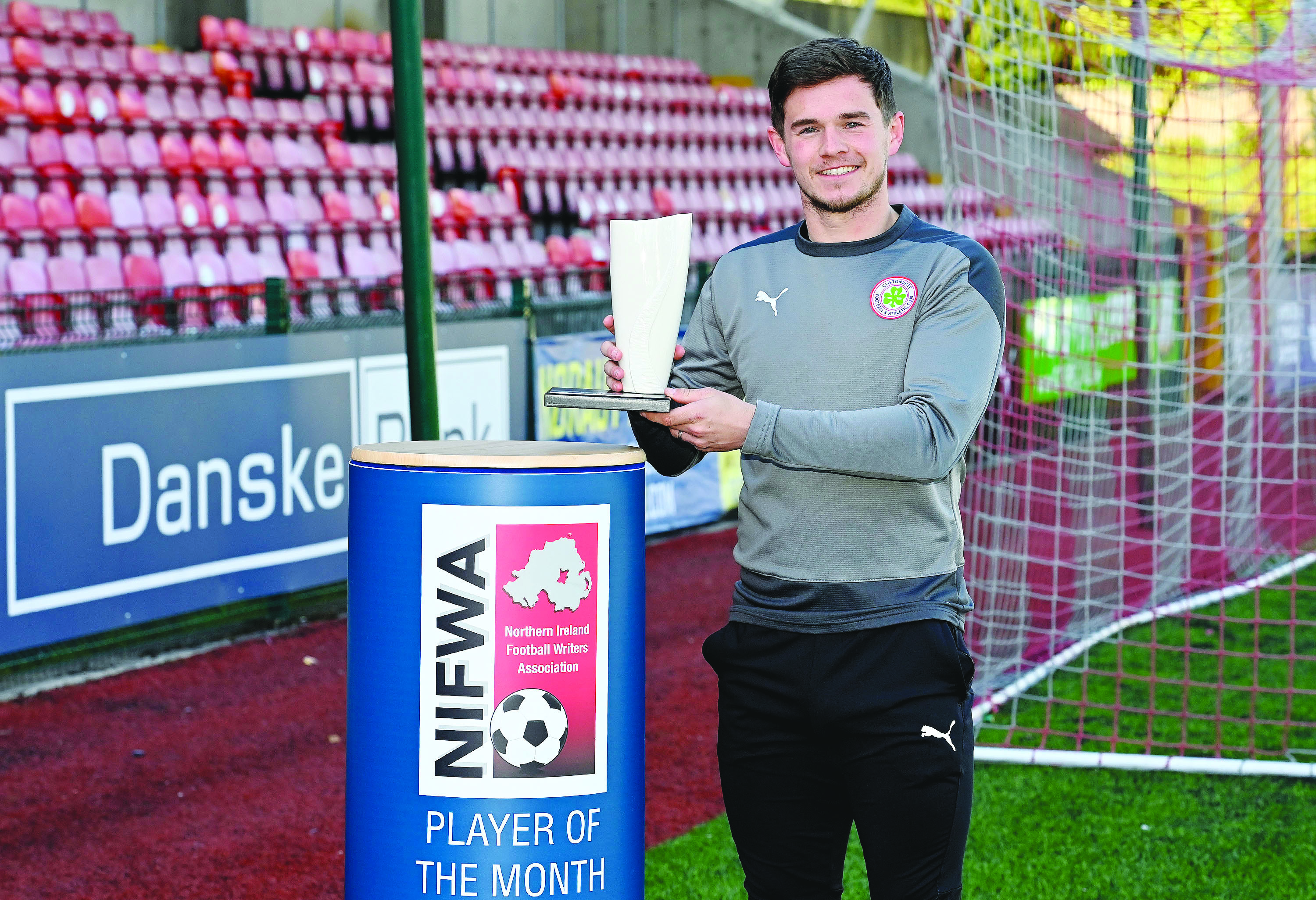 Michael McCrudden with his Player of the Month trophy for April