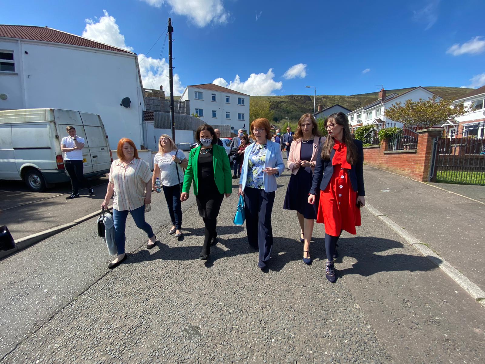 SUPPORT: Sinn Féin President Mary Lou McDonald is accompanied by Ballymurphy Massacre families as she visits the site of two of shootings
