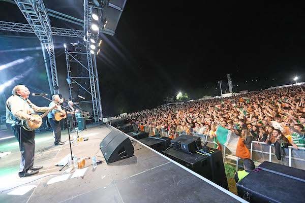 FÉILE NIGHTS: The Wolfe Tones play to a packed Falls Park during Féile 2019