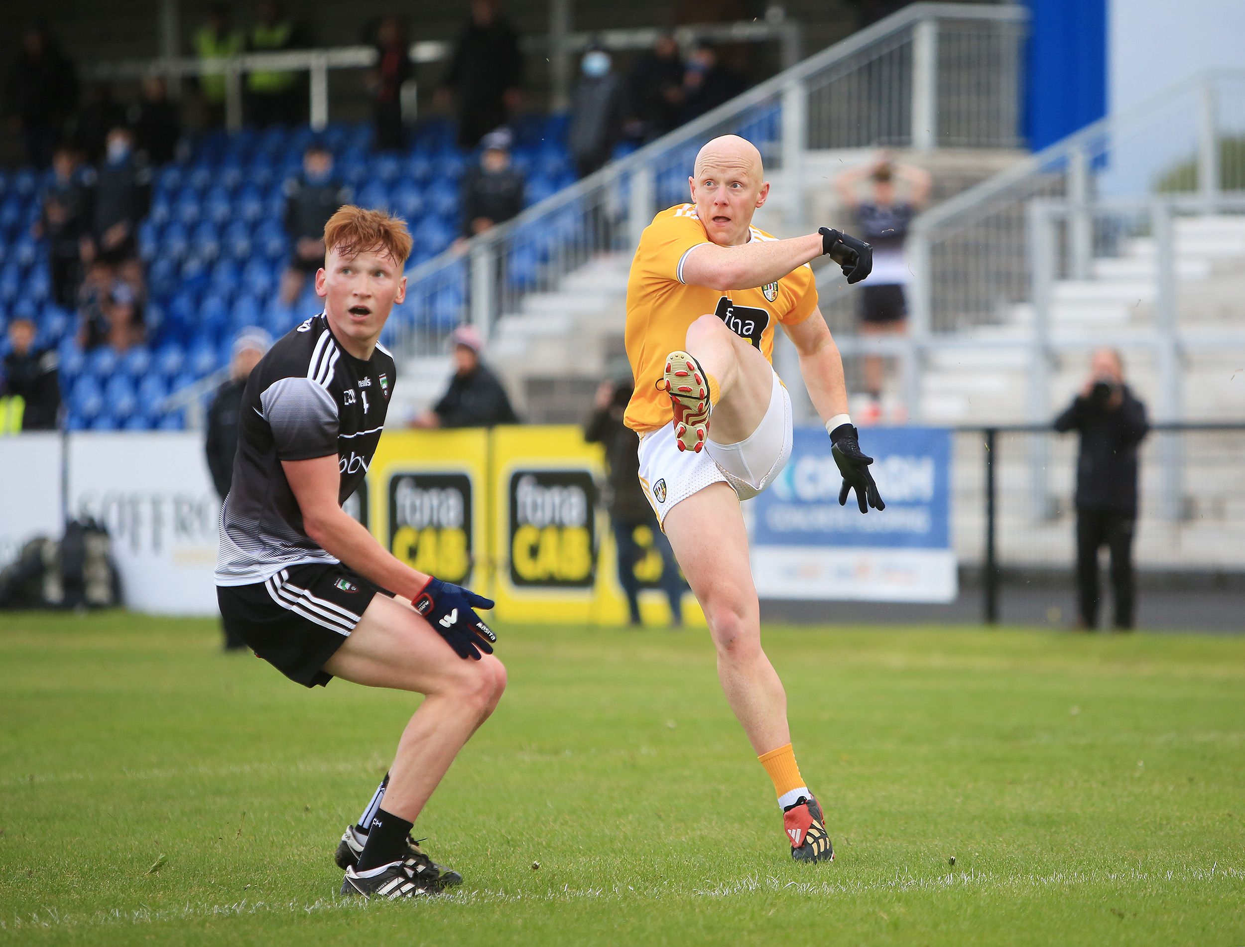 Paddy Cunningham kicks the winning point deep into stoppage time