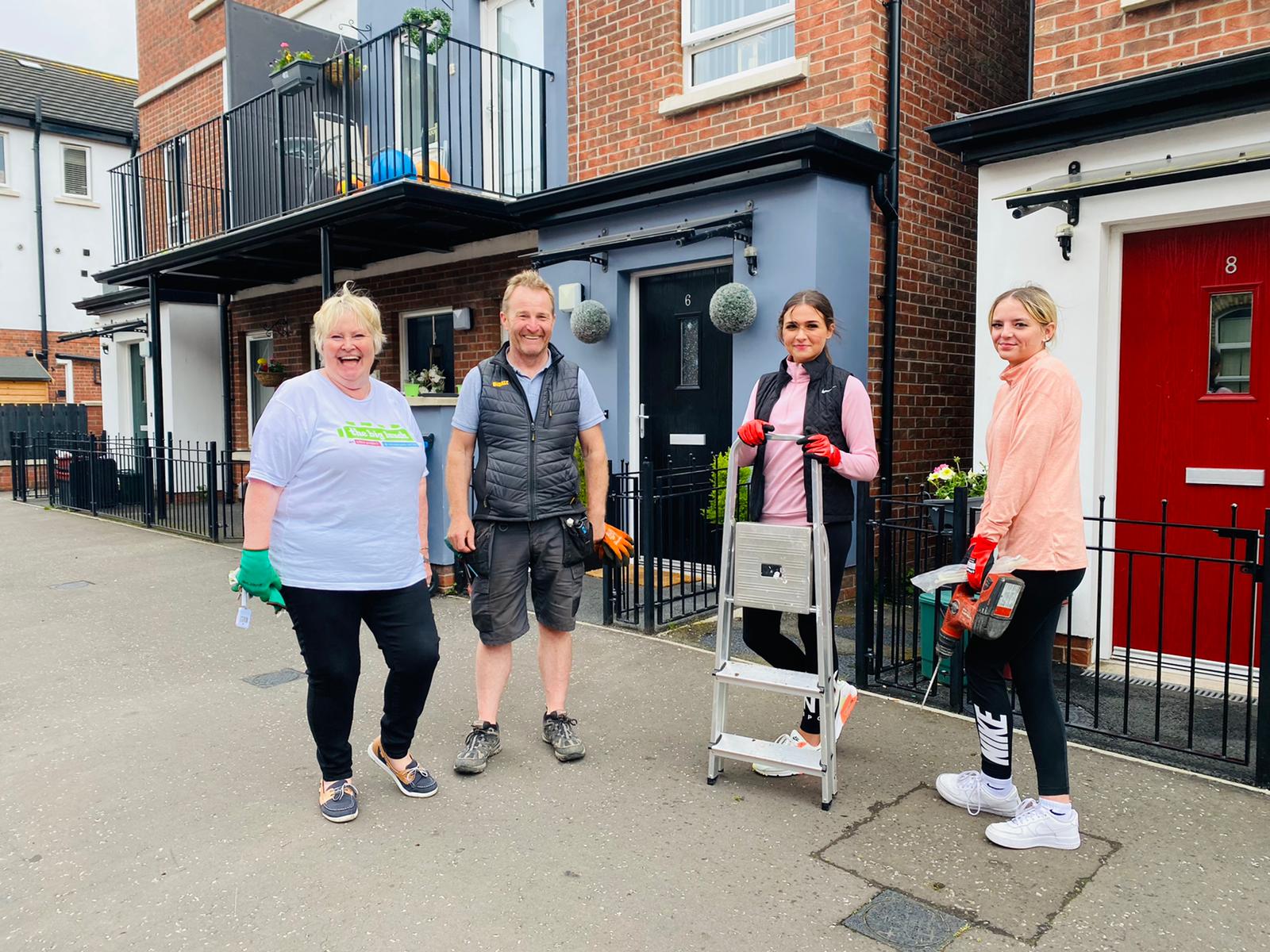 COMMUNITY CLEAN-UP: Rosemary McGreevy from TDK Community Group and Sinn Féin councillor JJ Magee with Alex Kane and Kaitlyn Owen