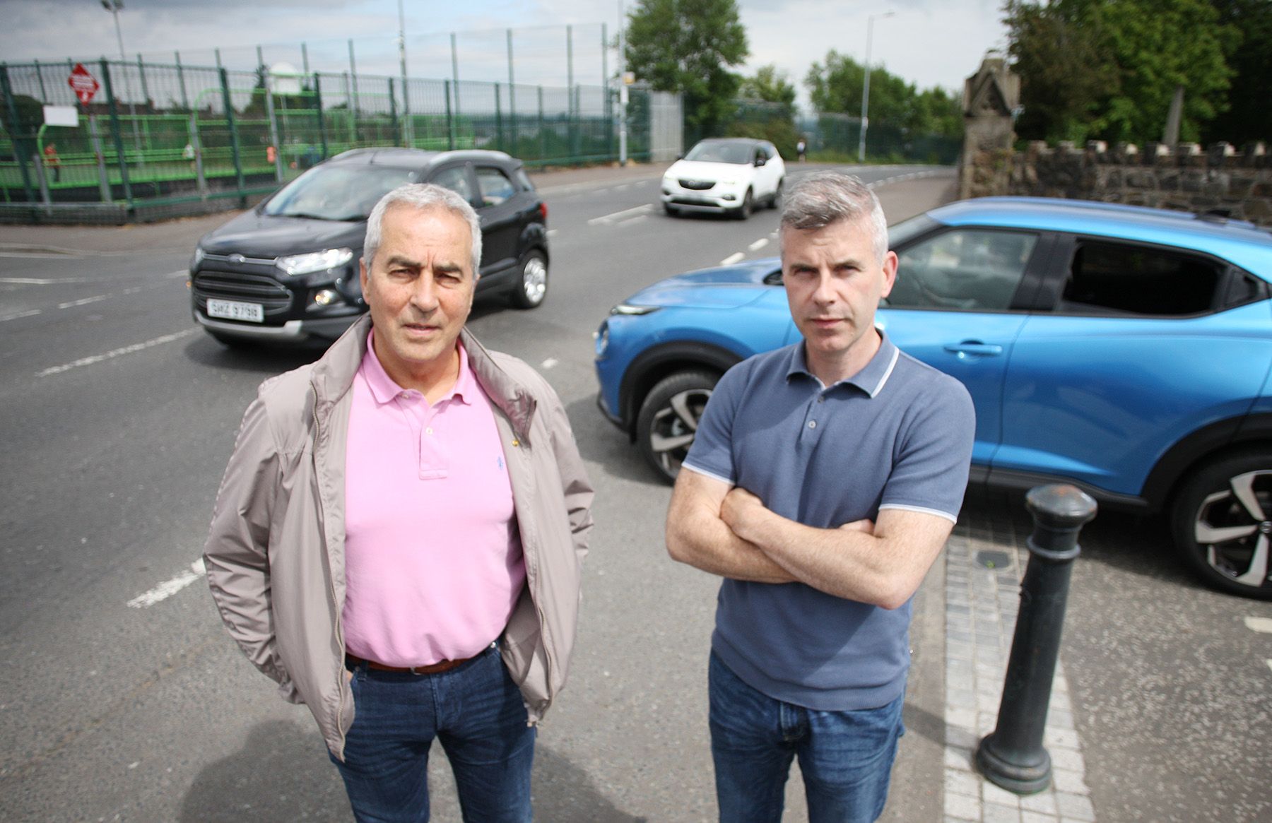 DANGER: Sinn Féin Councillor Steven Corr and party colleague Pat Sheehan MLA have called on DfI to install a new crossing on the Whiterock Road