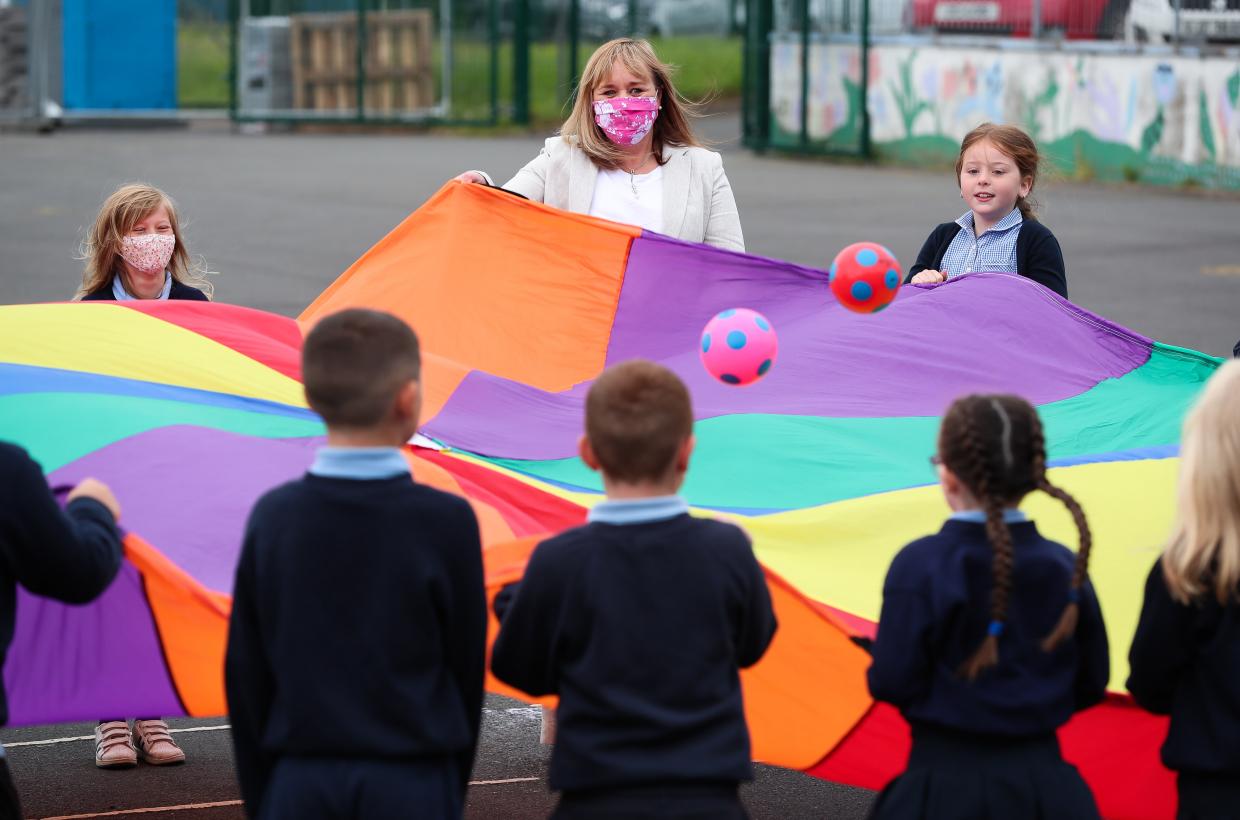 AWARD: Education Minister Michelle McIlveen with pupils from Ballysillan Primary School in North Belfast