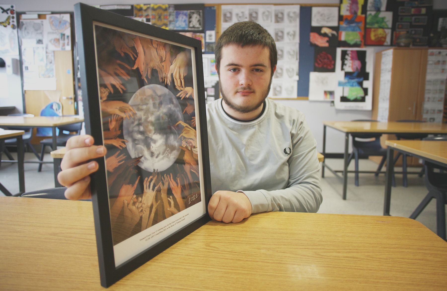 IN OUR HANDS: Emmett said that his artwork was inspired by a video on the UN Sustainable Development Goals
