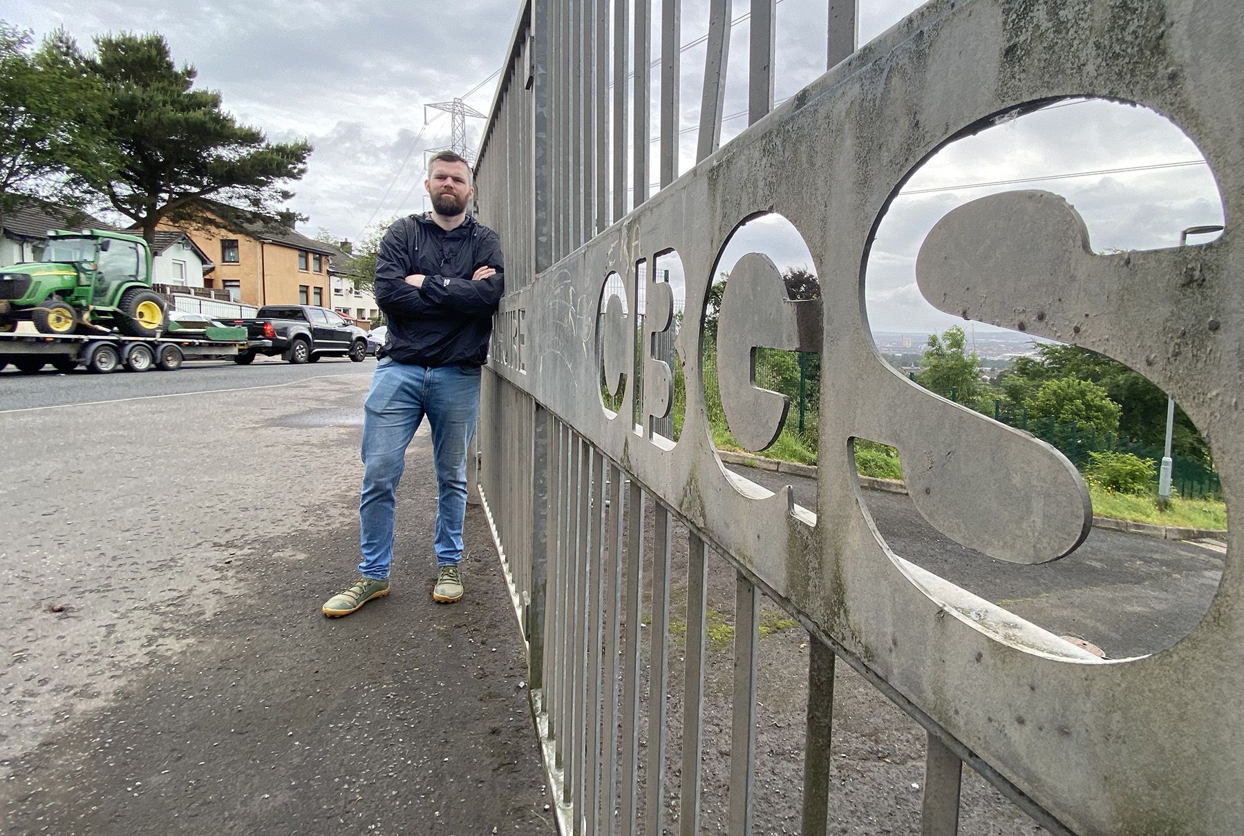 CONCERN: Gerry Carroll MLA at the entrance to St Mary\'s CBGS