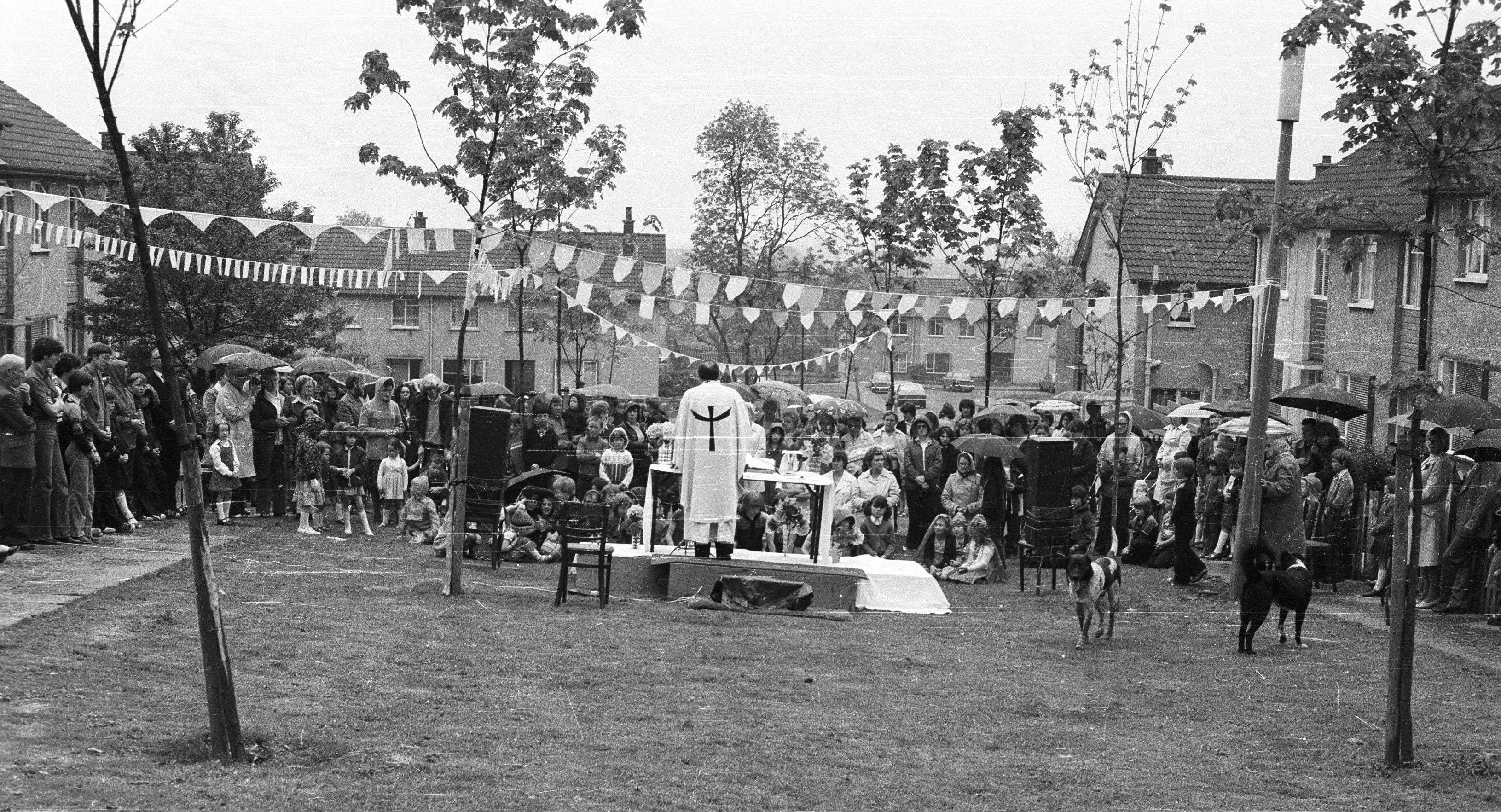 TOGETHER: Fr Kerr celebrates Mass in Cresslough Gardens, Lenadoon, in June 1979