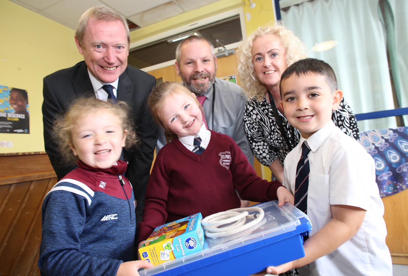 IN THE BOX: Martin Short CCMS, Principal Sean McNamee and Vice-Principal Gillian McCotter WITH pupils Rionach, Charlotte and Jacob