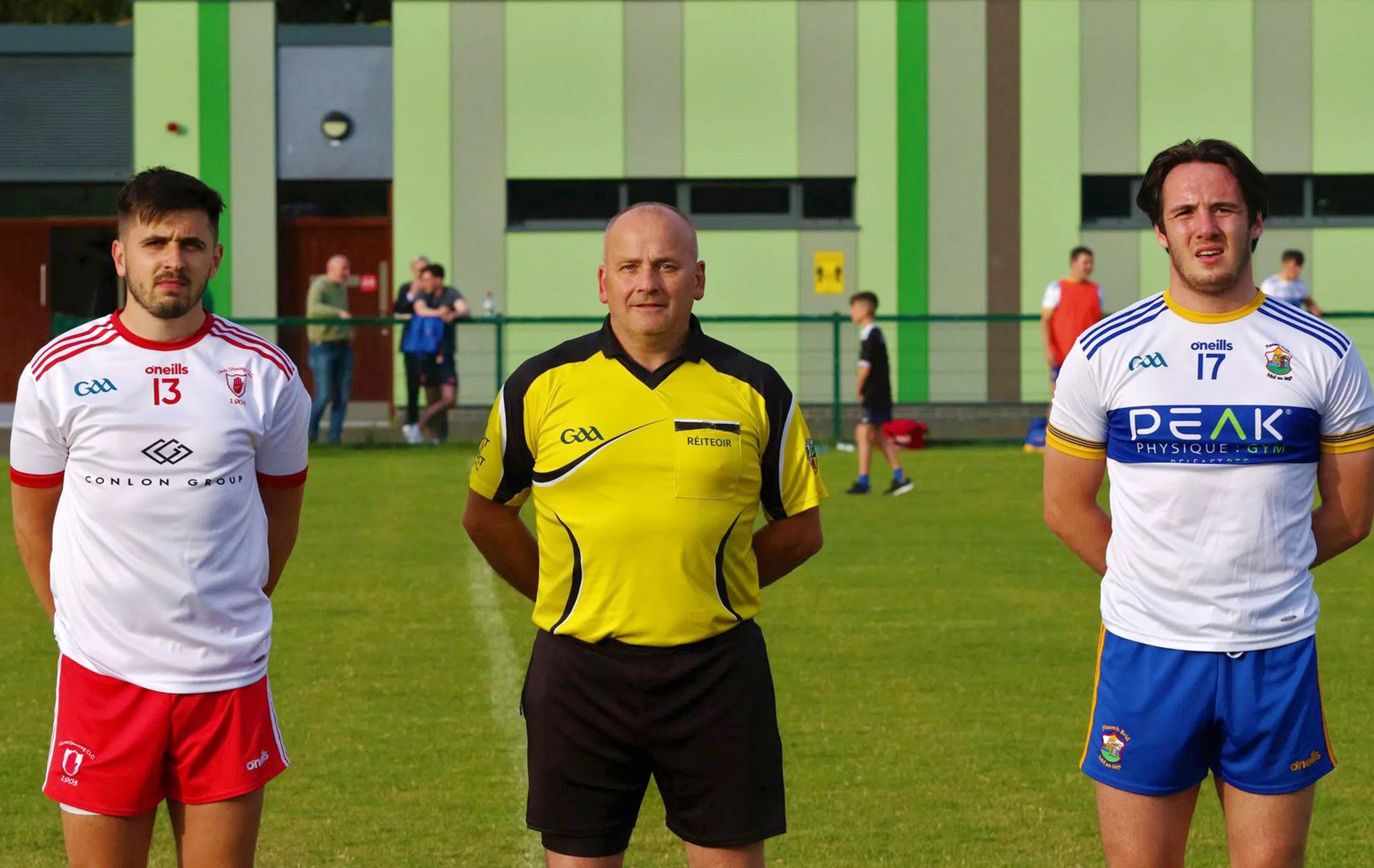 Tam captains Terry McCrudden and Patrick Finnegan with referee Danny O\'Neill