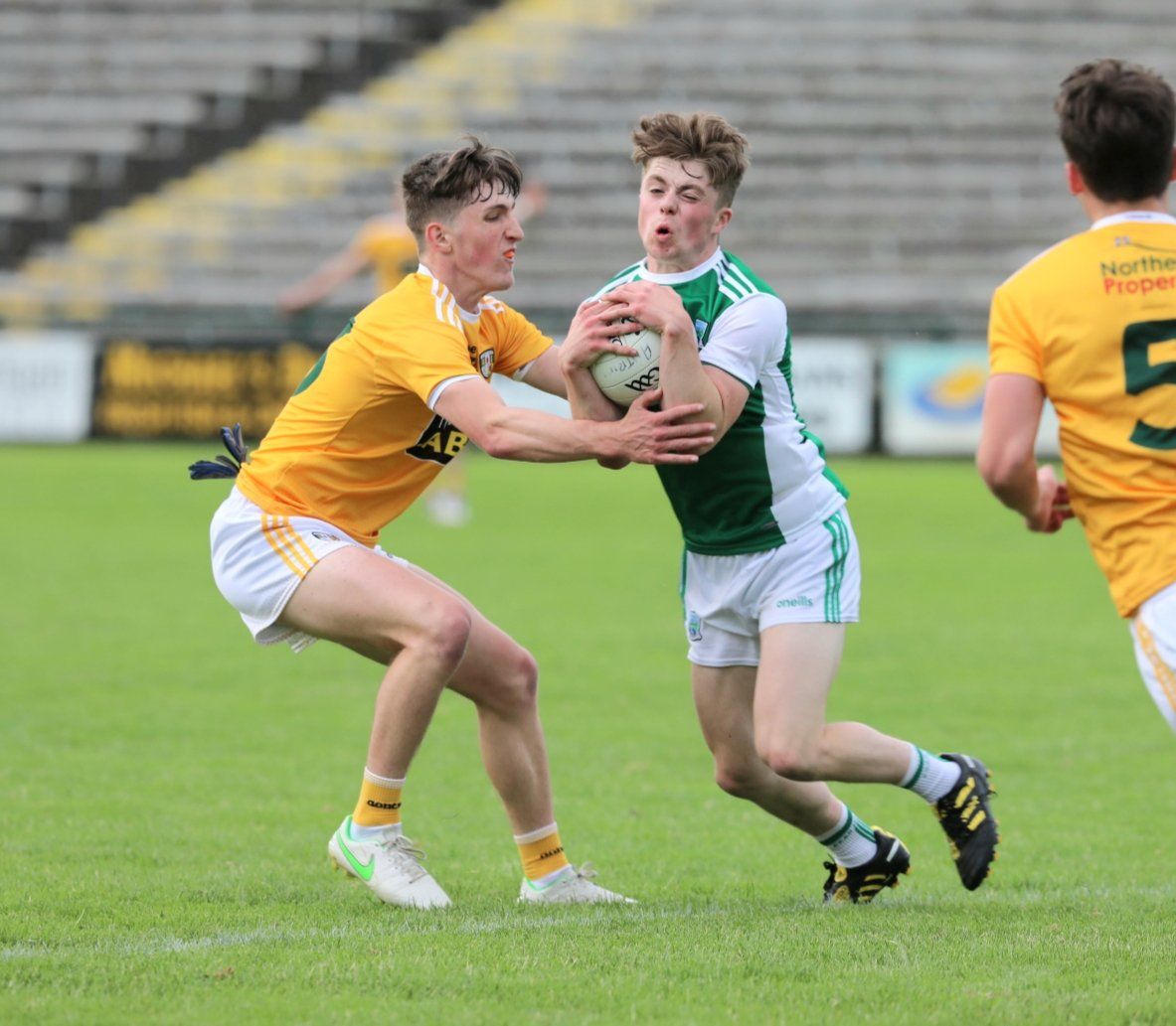 Fermanagh\'s Tom Keenan is tackled by Antrim\'s Fergal Henry during Friday night\'s Ulster U20 Football Championship game in Brewster Park with the Ernemen winning by nine points to progress to the semi-final 