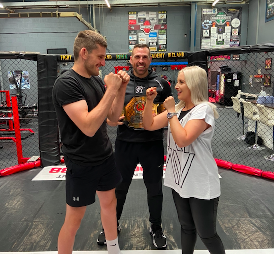 PUT \'EM UP: Órlaithí Flynn met with Joe McColgan and his coach Liam Shannon at Fight Academy in Poleglass