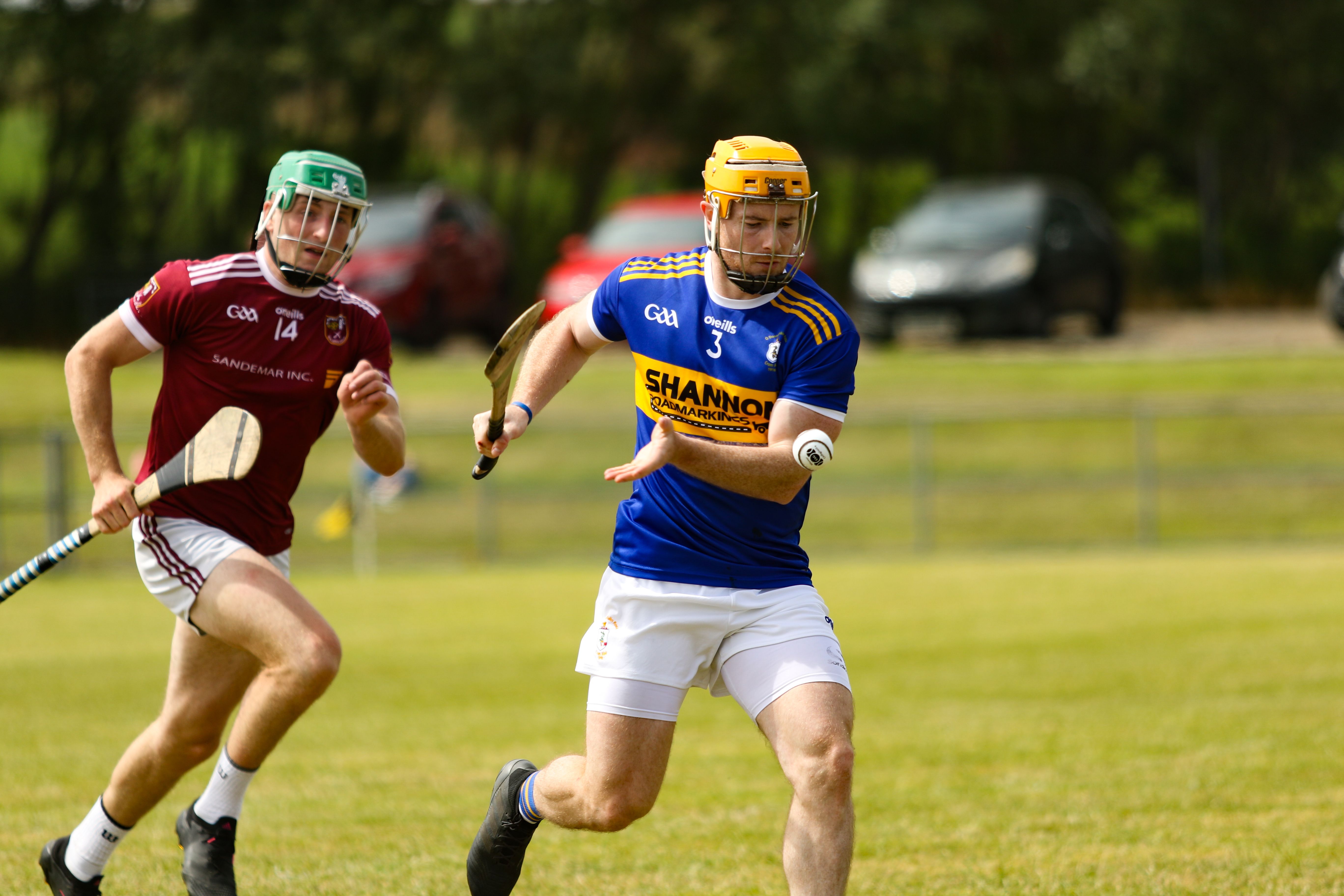 Ciaran Orchin clears under pressure from Niall McCormick