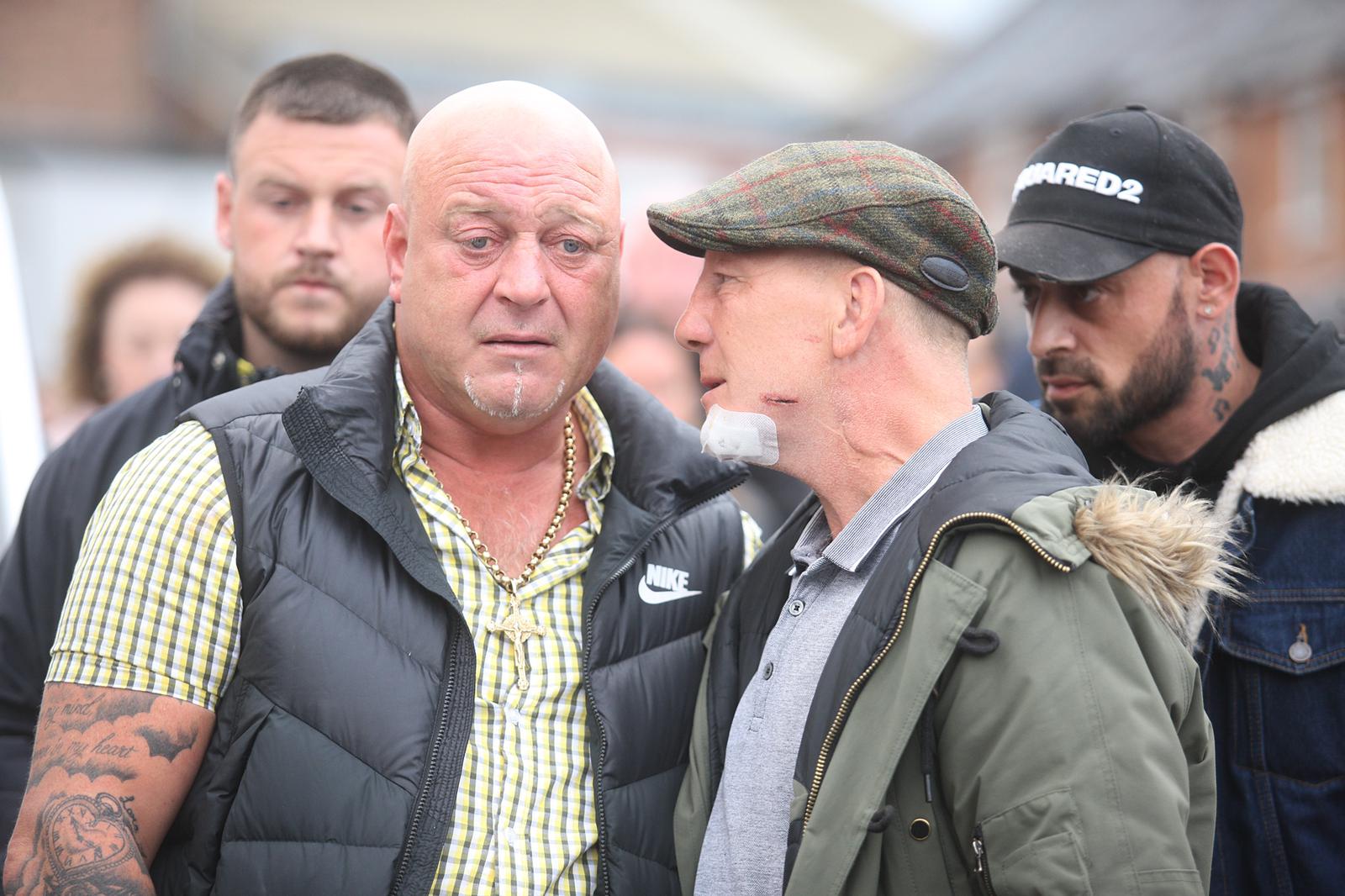 SUPPORT: Eamonn Magee with baby Liam\'s father, Liam O\'Keefe Sr at a vigil last Thursday in Ardoyne