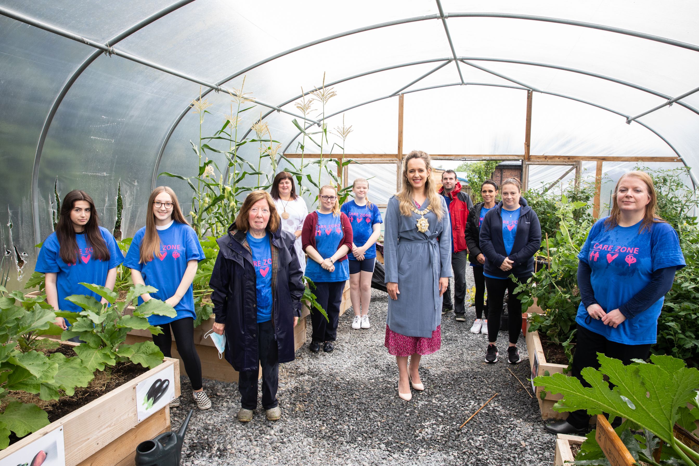 FAMILY FUN DAY: Lord Mayor Kate Nicholl with Care Zone partners, community champions and volunteers at Our Lady’s Primary School in Deanby Gardens.