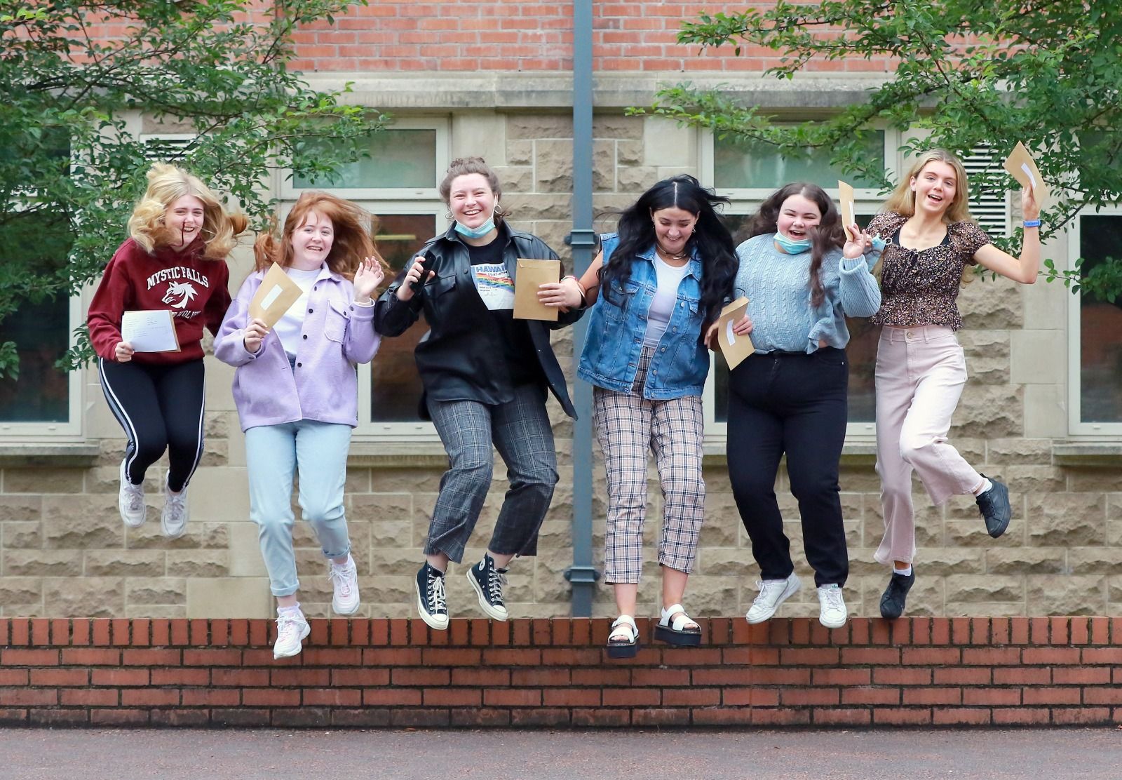 HEROES: Pupils at St Dominic\'s celebrating their A-level results today