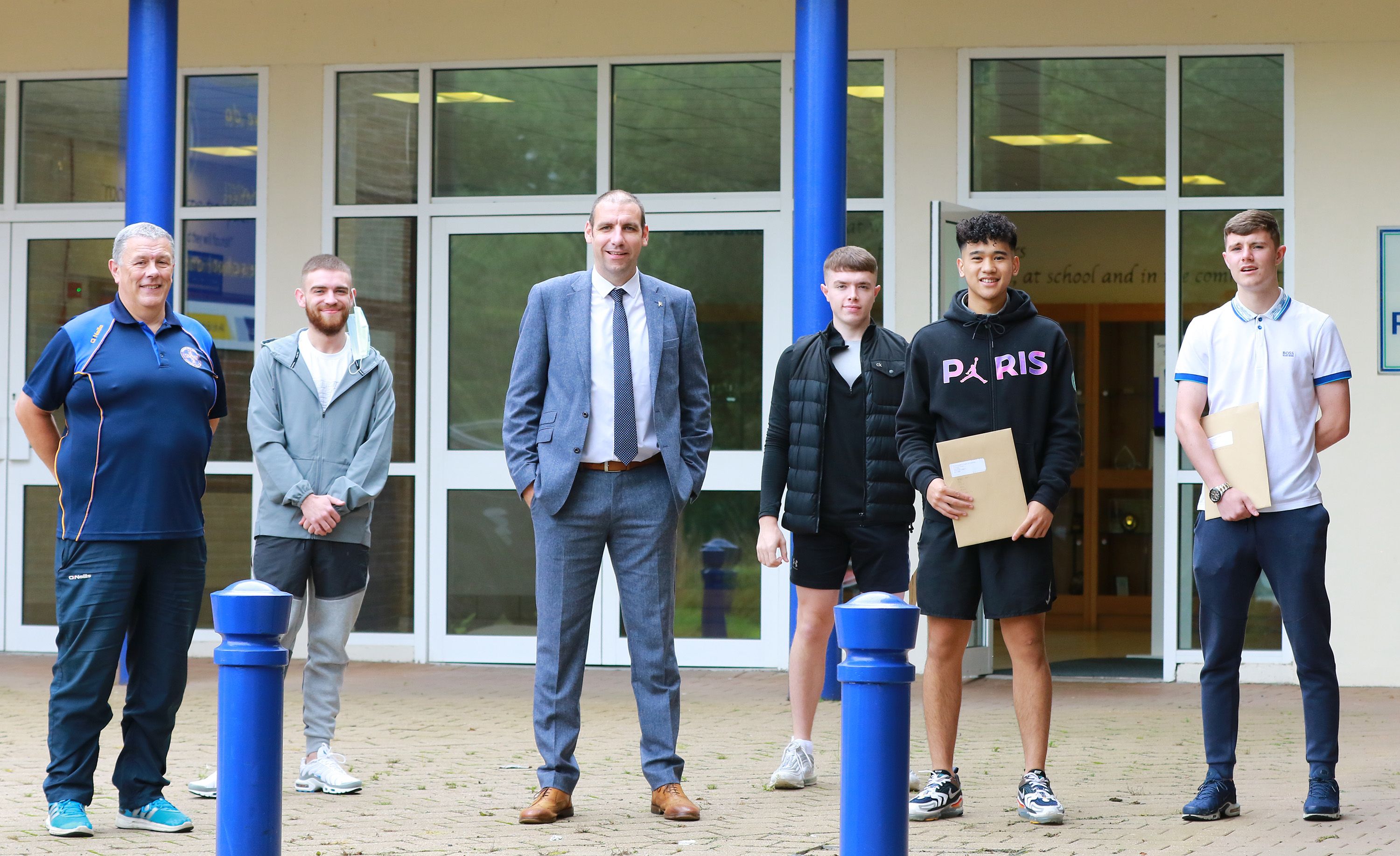 RESULTS DAY: Edmund Rice College Principal Paul Berne with A-Level students