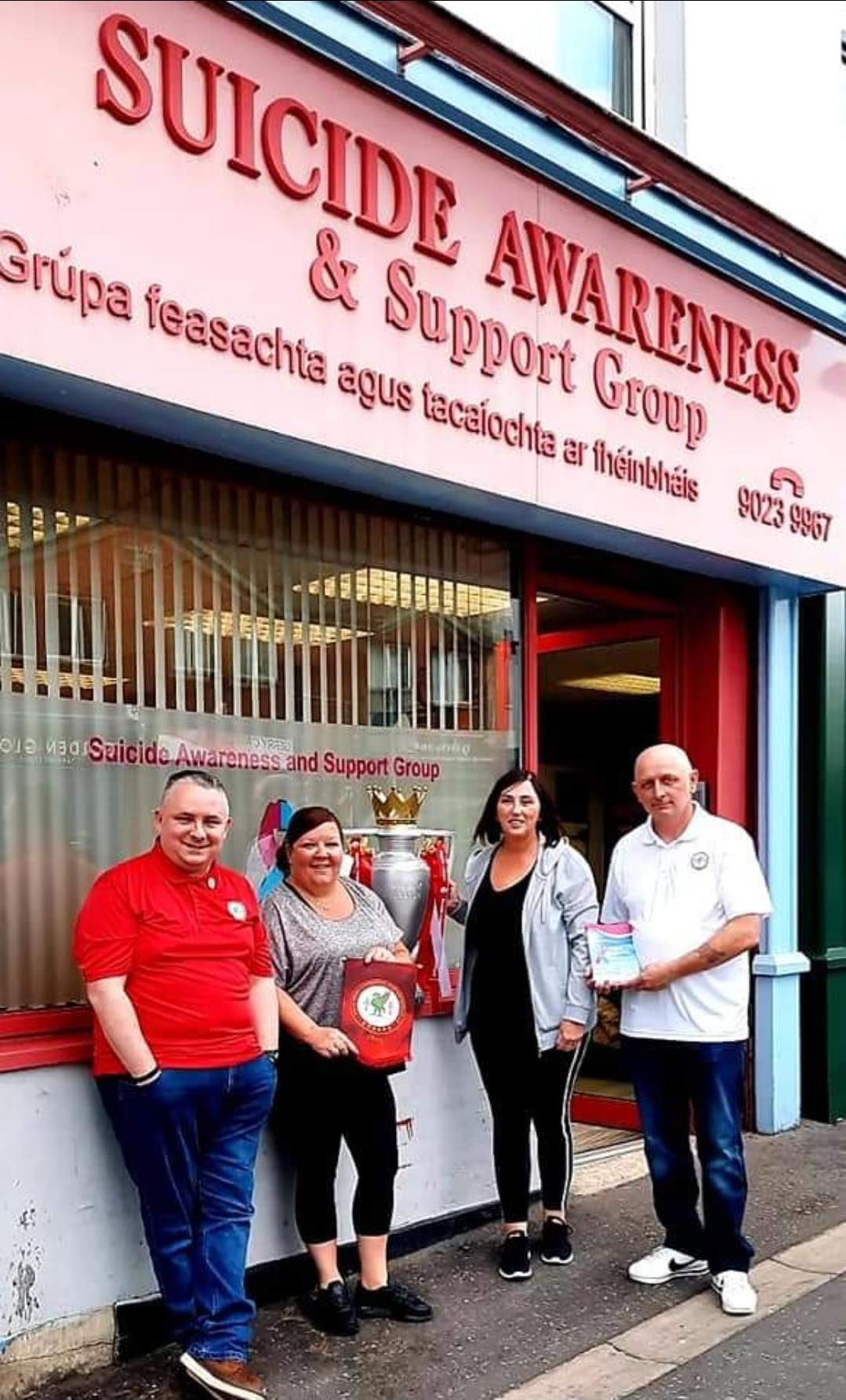 SUICIDE CHARITY SUPPORT: Martin Cummins (Chairman), Margaret Walker (SASG), Margaret Lismore (SASG), Ciaran McConnell (Vice Chair) from Falls Road Liverpool FC Supporters\' Club