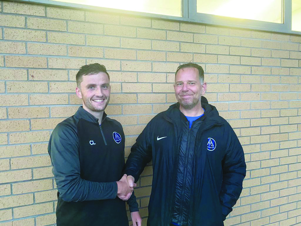 Man-of-the-match against Bryansburn, Caolan Lynch, with Aquinas coach Lawrence Watson