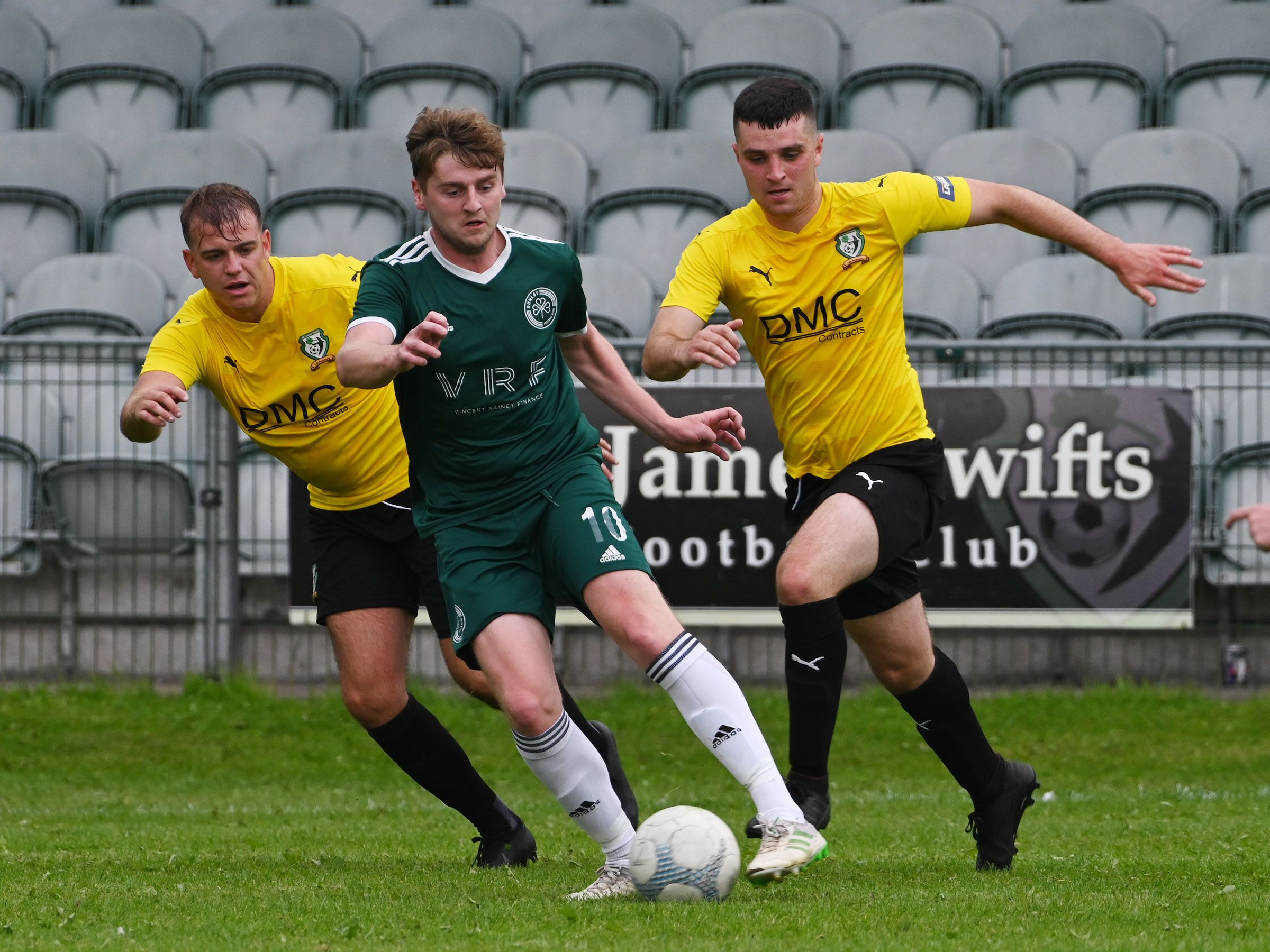 Dunloy\'s Caolan Gillan gets out in front of a couple of St James\' Swifts challenges on Saturday