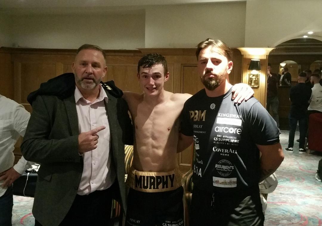 Colm Murphy with manager, Mark Dunlop and coach, Dee Walsh after Saturday\'s win 