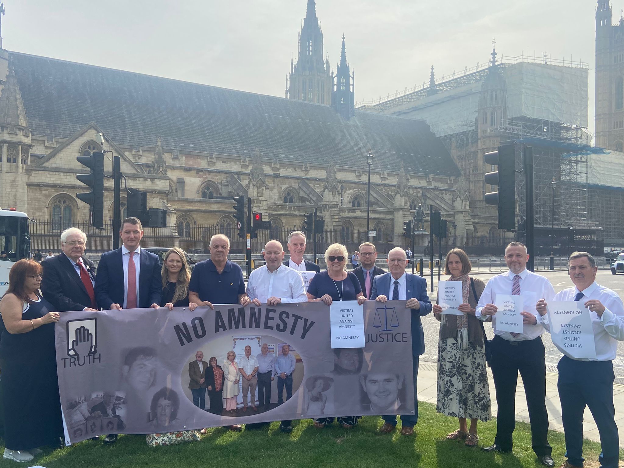 NO AMNESTY FOR MURDER: Relatives are joined by North Belfast MP, John Finucane at Westminster