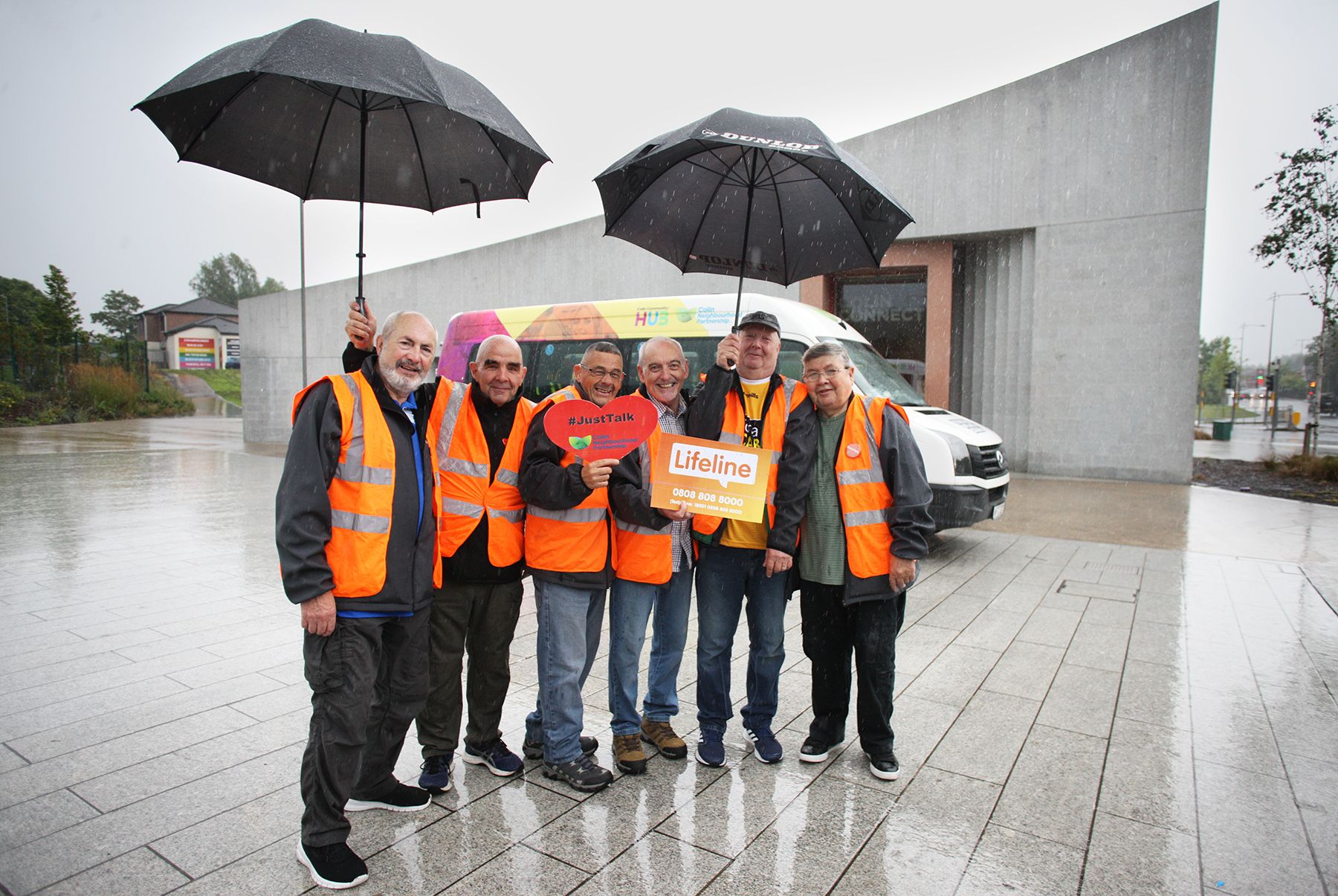 TOGETHER: Volunteers brave the elements at Colin Neighbourhood Partnerships Walk & Talk event on World Suicide Prevention Day