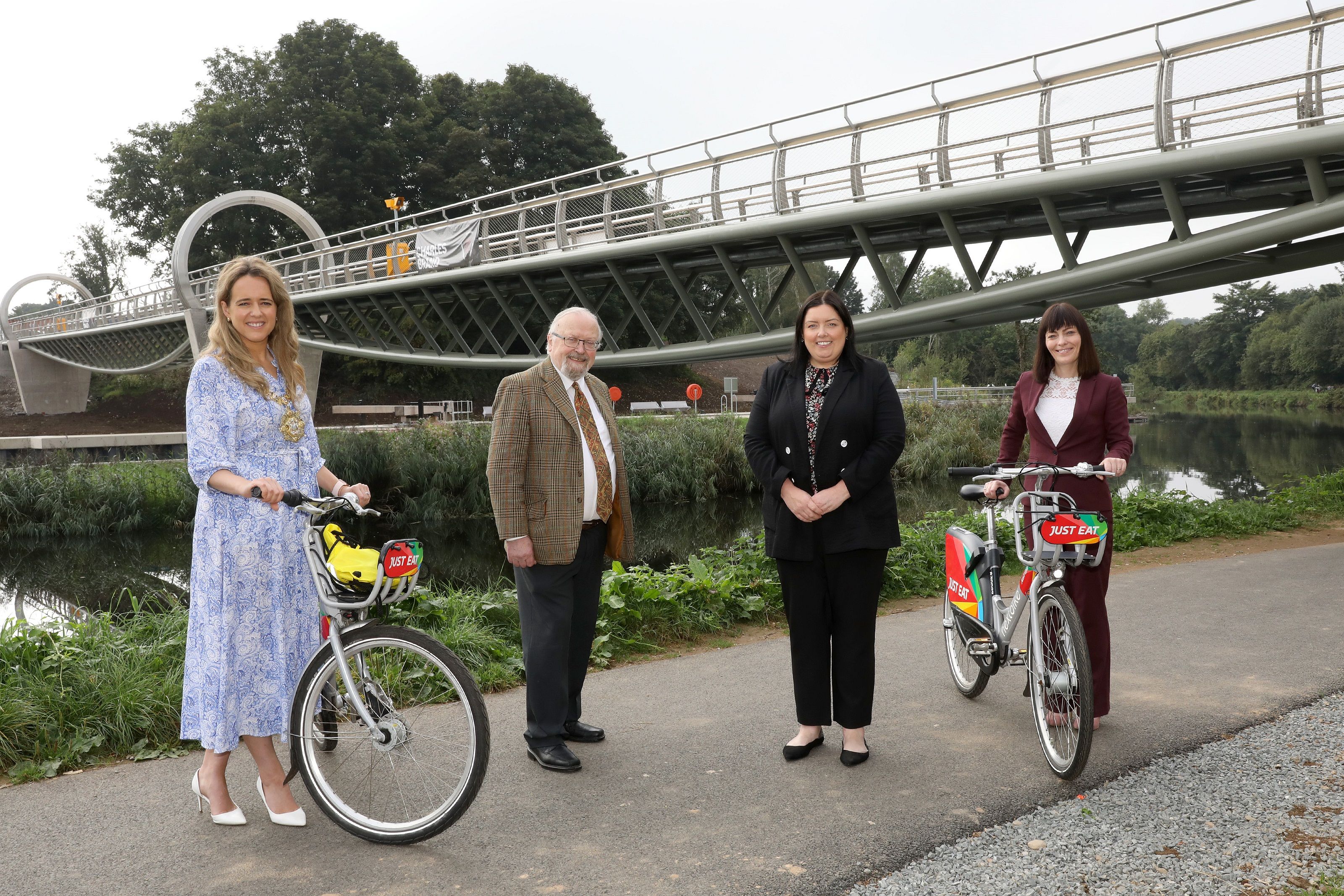 NEW BRIDGE WELCOME: Communities Minister Deirdre Hargey, Infrastructure Minister Nichola Mallon, Lord Mayor Councillor Kate Nicholl and Erskine Holmes from Urban Villages 