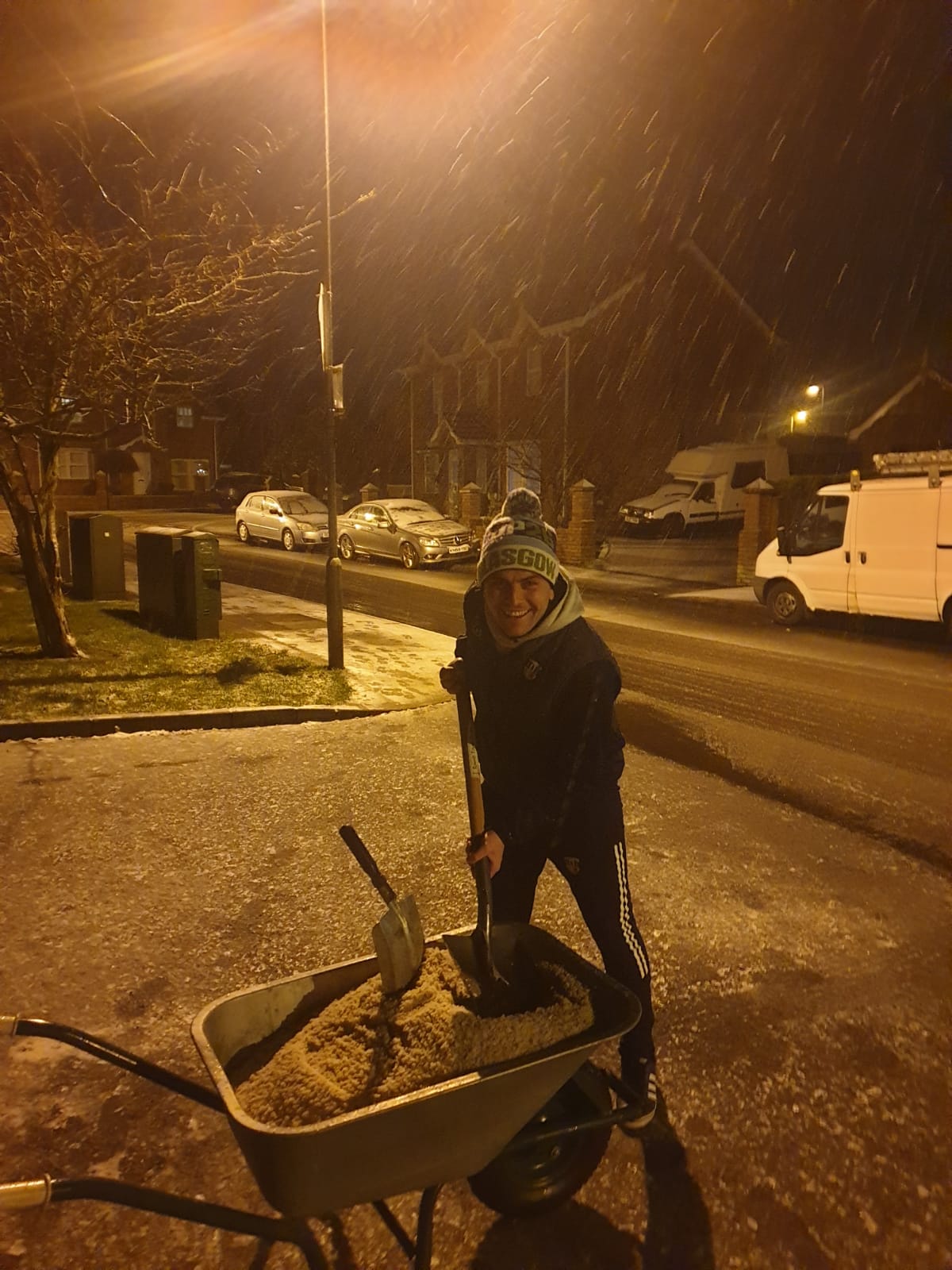 LET IT SNOW: Cllr Baker was on the ground to distribute grit and salt across the Colin area