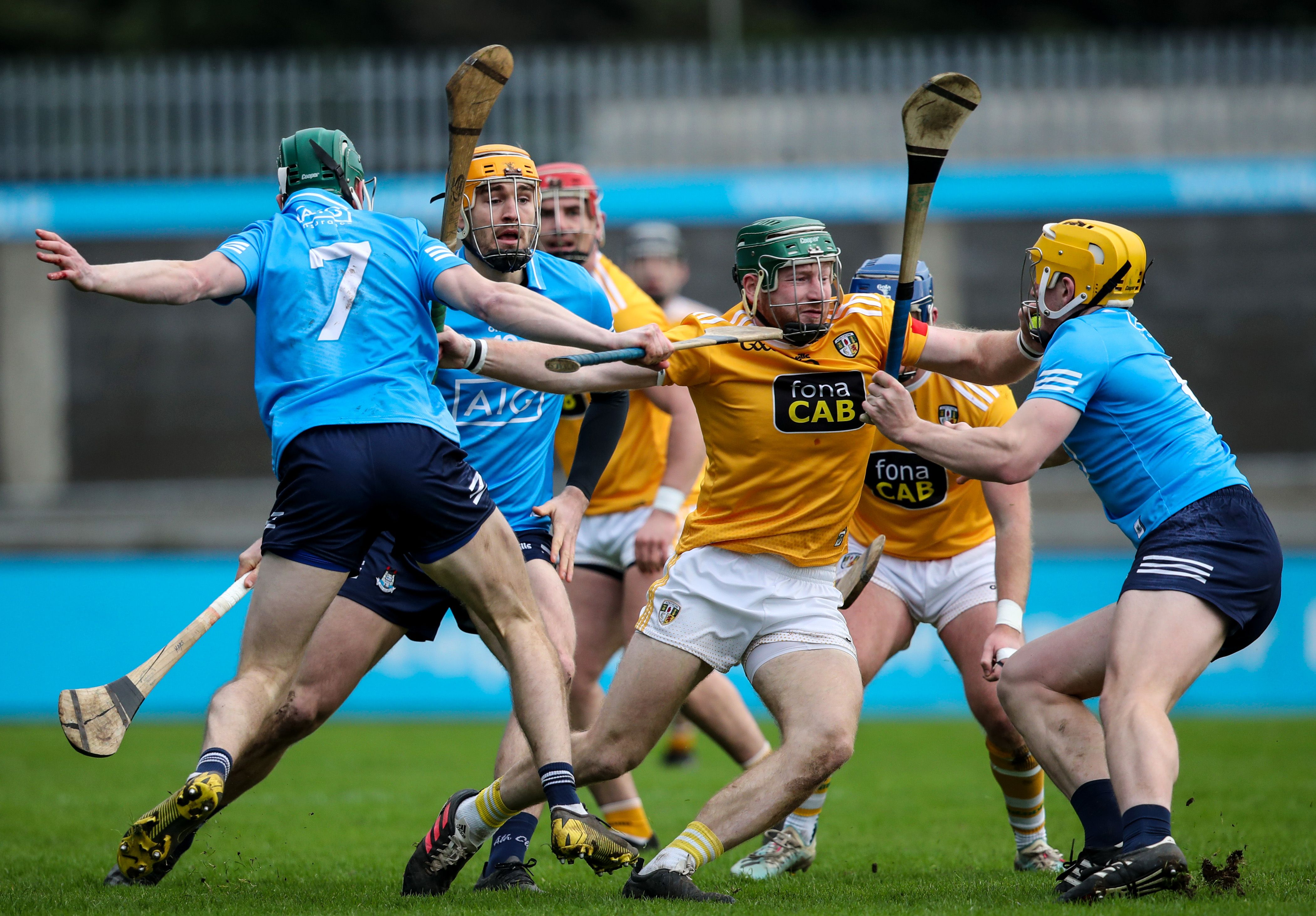 Niall McKenna tries to break through a wall of blue jerseys at Parnell Park on Sunday 
