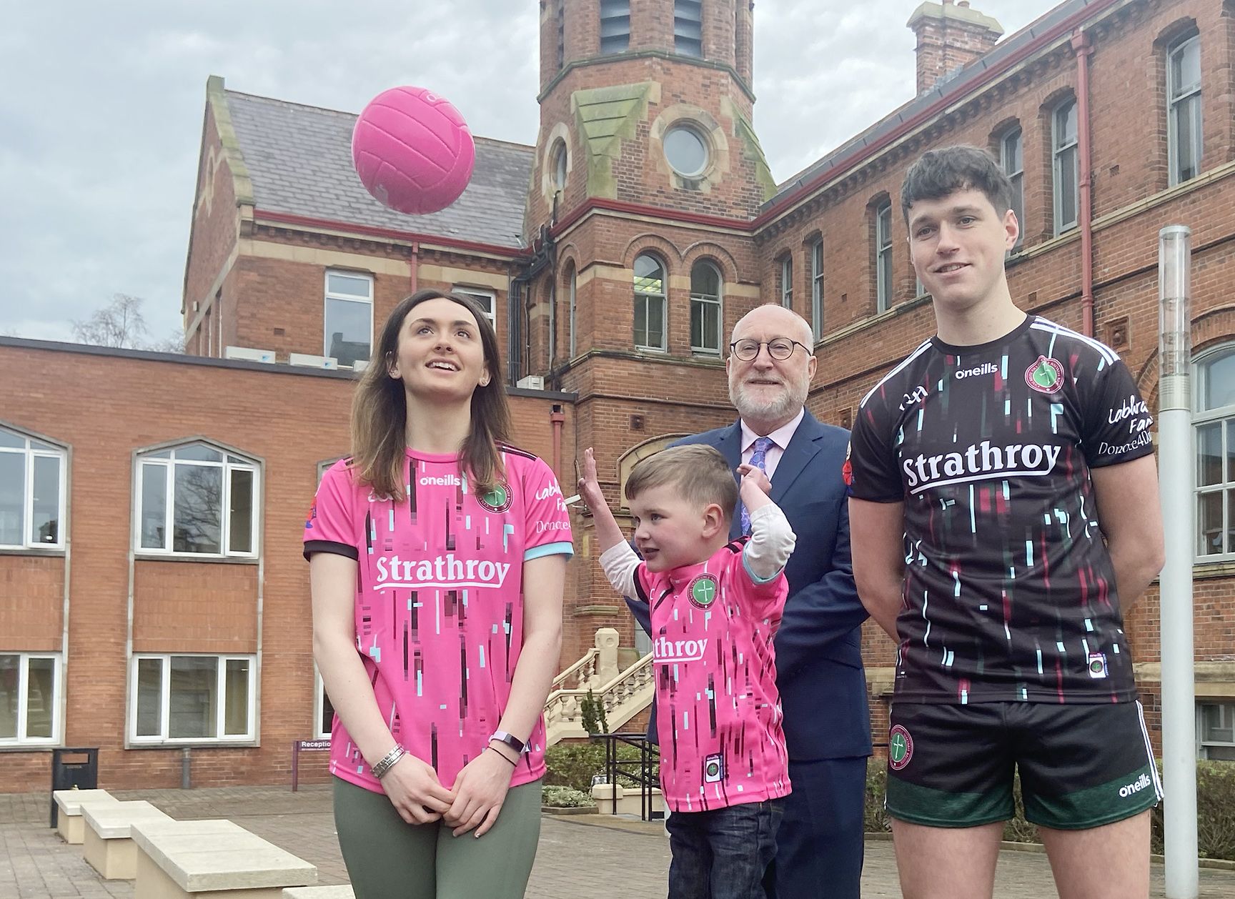 DONATE: Dáithí Mac Gabhann joined St Mary’s University College players Charlie Smyth (Down GAA) and Charlie Shevlin (Armagh LGFA) and Prof Peter Finn to launch the new jersey. 