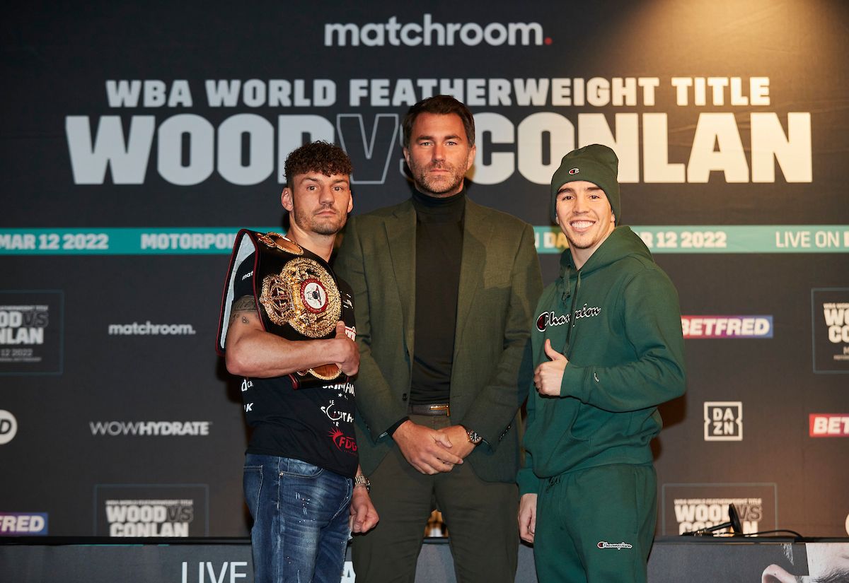 Leigh Wood and Michael Conlan with promoter Eddie Hearn on Thursday 
