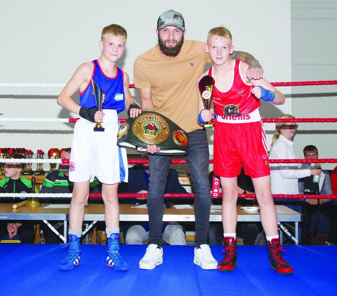 Mark Dawson (Holy Trinity) (right) and Keziah Kindon (Merseyside & Cheshire) and are presented with their trophies by IBO World boxing champion Anthony Cacace after a cracking club international contest 