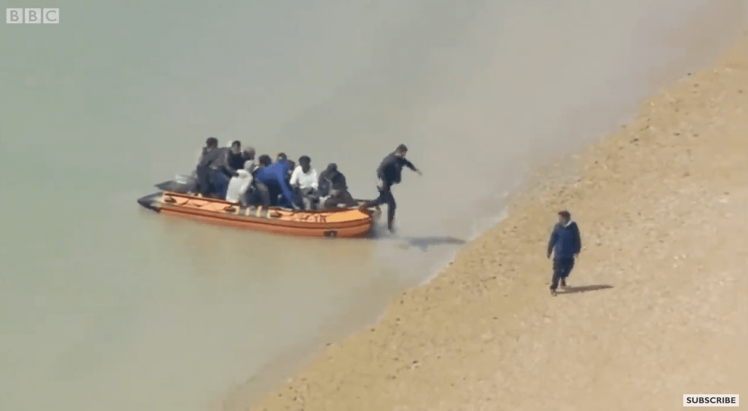 ARRIVALS: Migrants coming ashore after crossing the English Channel
