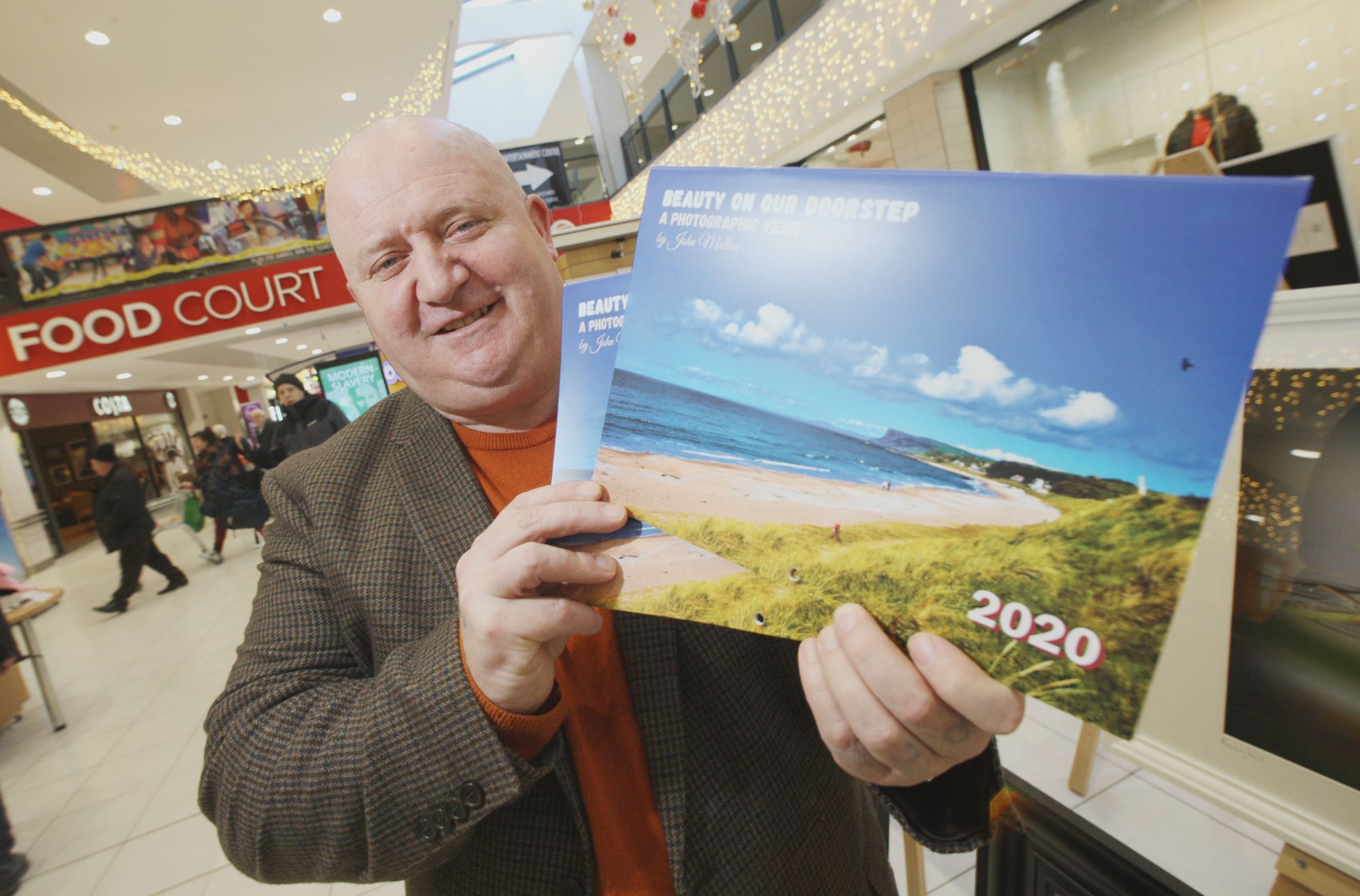 BEAUTY RETURNS: Photographer John Mallon will reopen his stall in the Kennedy Centre next week