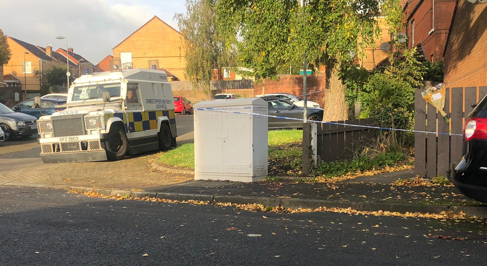 SCENE: Police remain at the scene of a murder in the Woodside area of Poleglass 