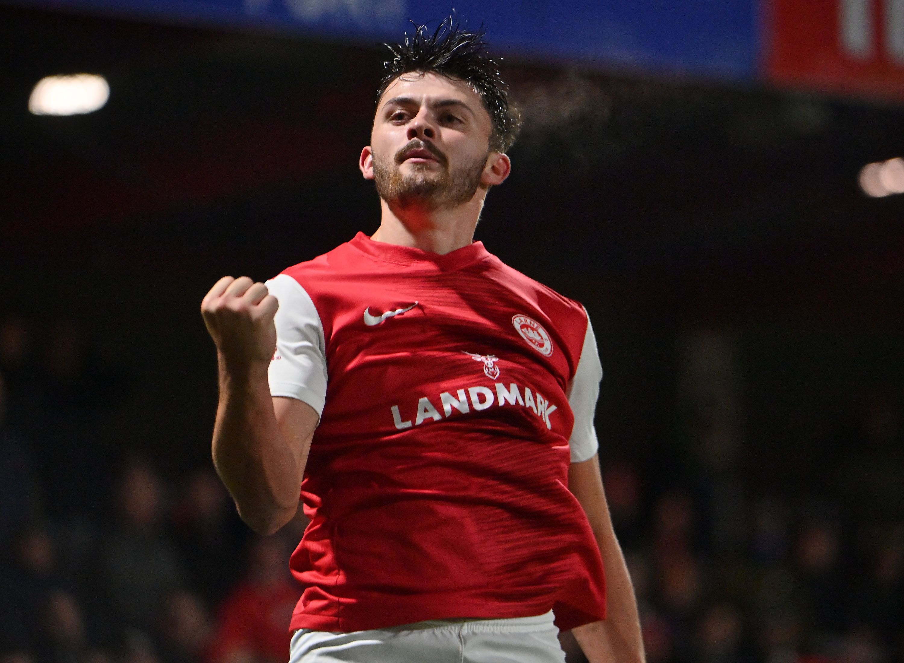 Lee Bonis celebrates completing his hat-trick at Inver Park on Friday 