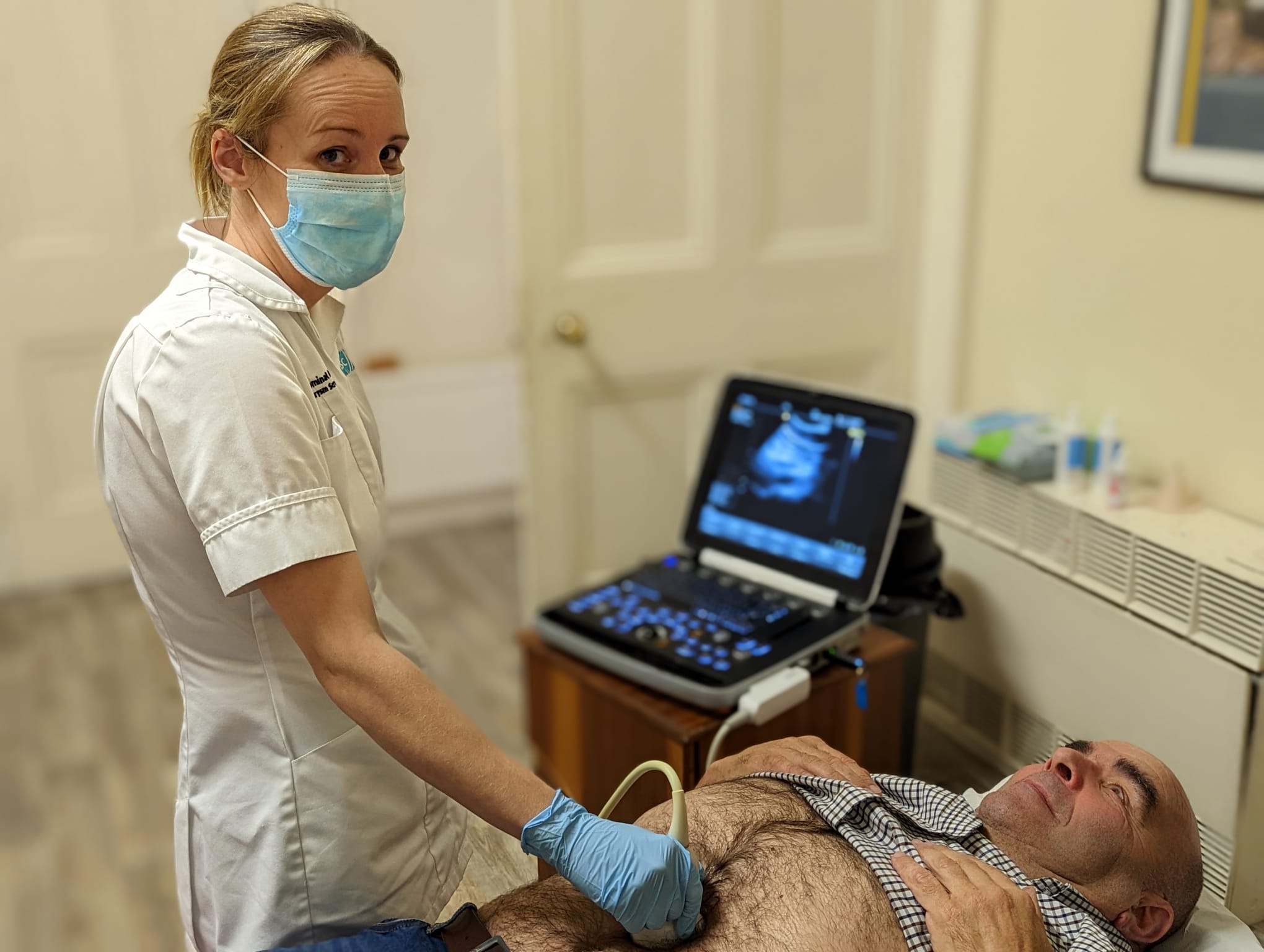 SCREENING: Nurse Paula Heaney performs an AAA screening on Umberto Scappaticci from Colin Neighbourhood Partnership