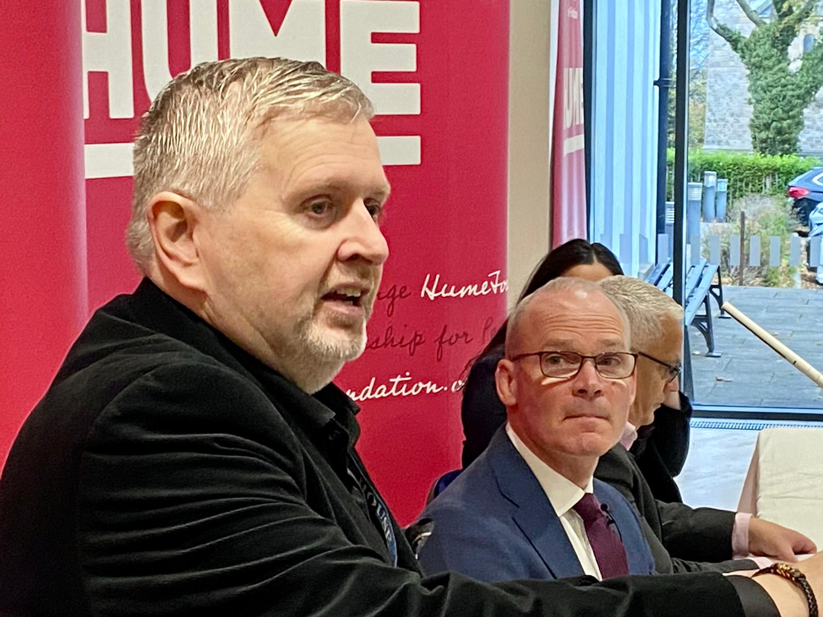 RETURN: Minister Simon Coveney and Fr Gary Donegan at the Hume Foundation event in the Houben Centre on Wednesday morning