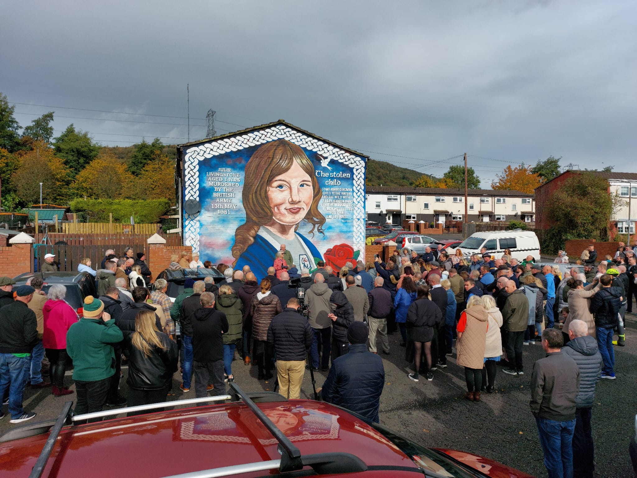 COMMUNITY: People gathered in Lenadooon  on Saturday for a rededication of the mural memorial for Julie Livingstone, an innocent victim of plastic bullets; below, Justice Minister Naomi Long