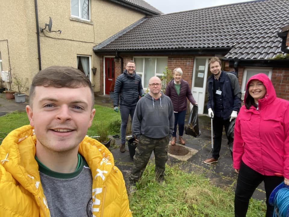 Cllr Caoimhín McCann and Habinteg Housing join together for community clean up 